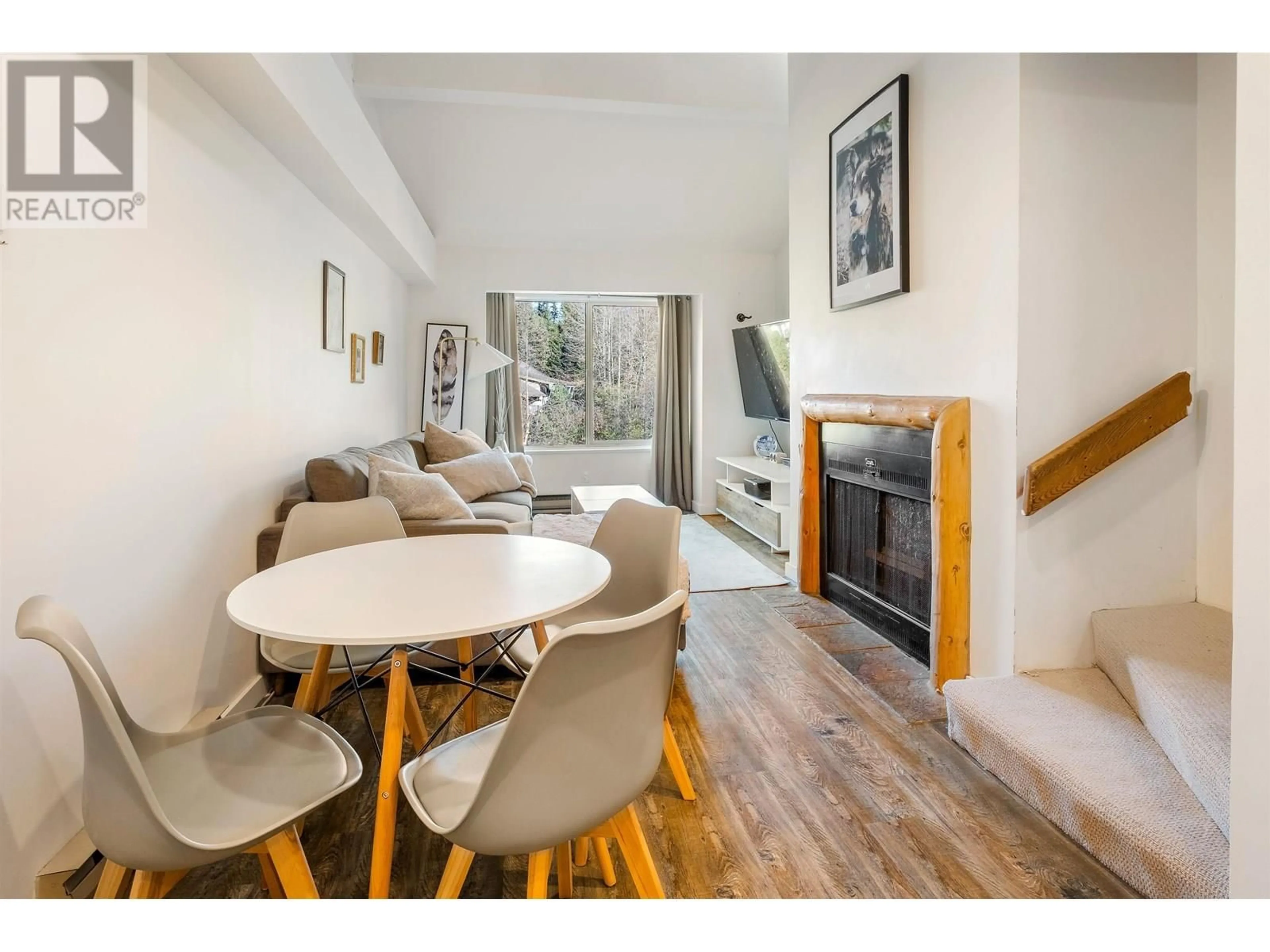 Living room with furniture, wood/laminate floor for 312 - 2021 KAREN CRESCENT, Whistler British Columbia V8E0H1