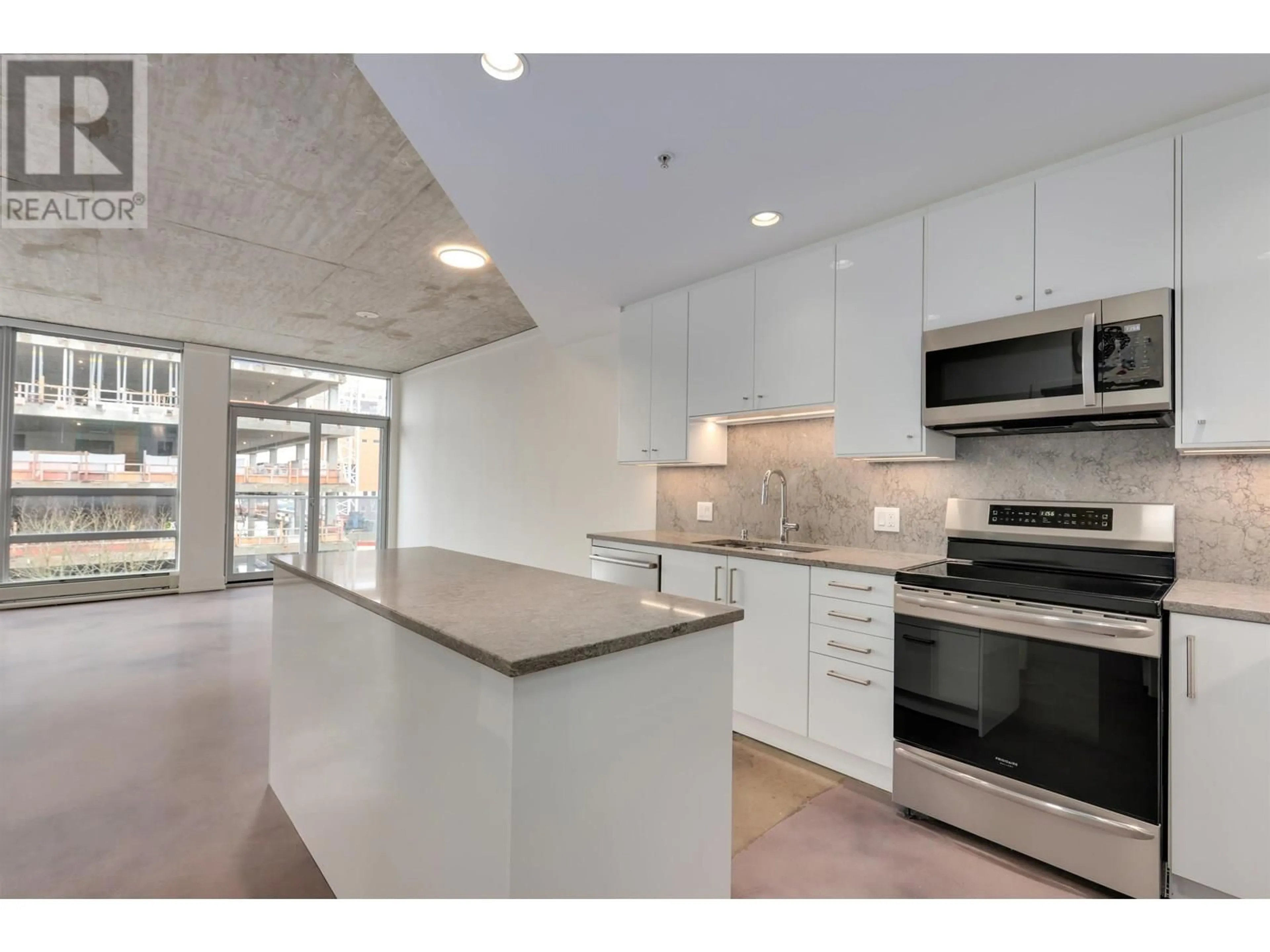Open concept kitchen, unknown for 604 - 919 STATION STREET, Vancouver British Columbia V6A4L9