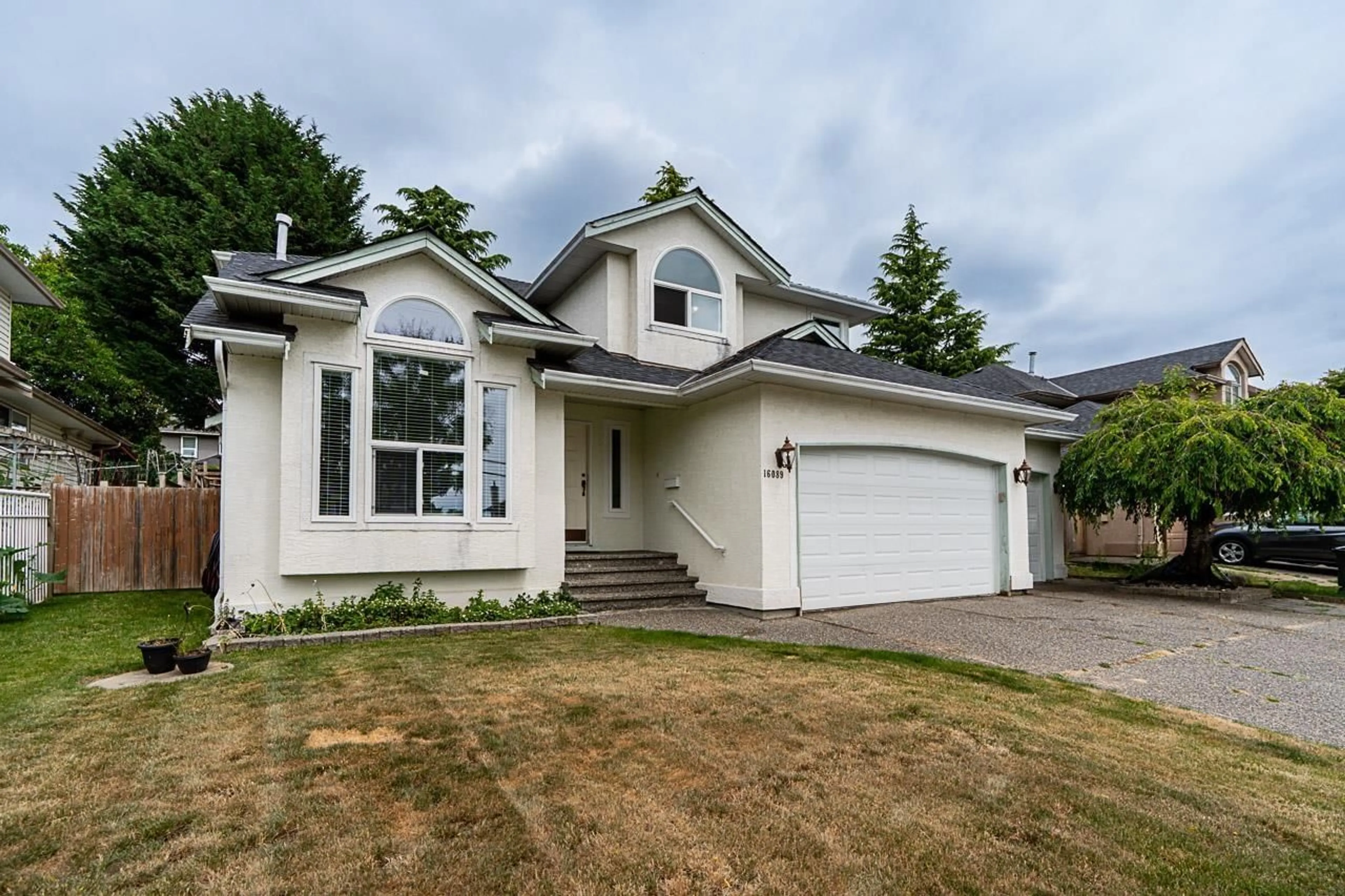 Home with vinyl exterior material, street for 16089 80, Surrey British Columbia V4N0X1
