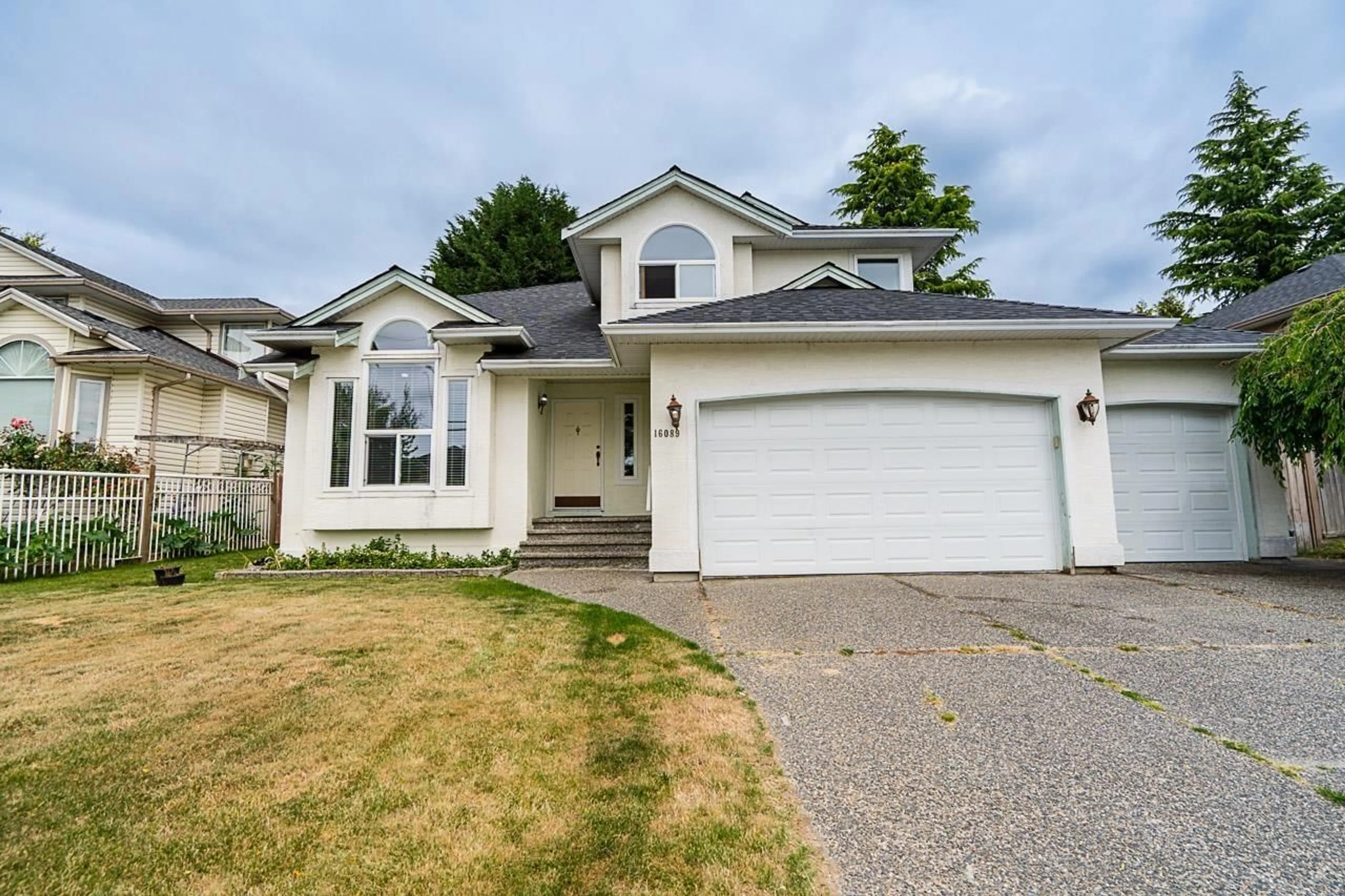 Home with vinyl exterior material, street for 16089 80, Surrey British Columbia V4N0X1