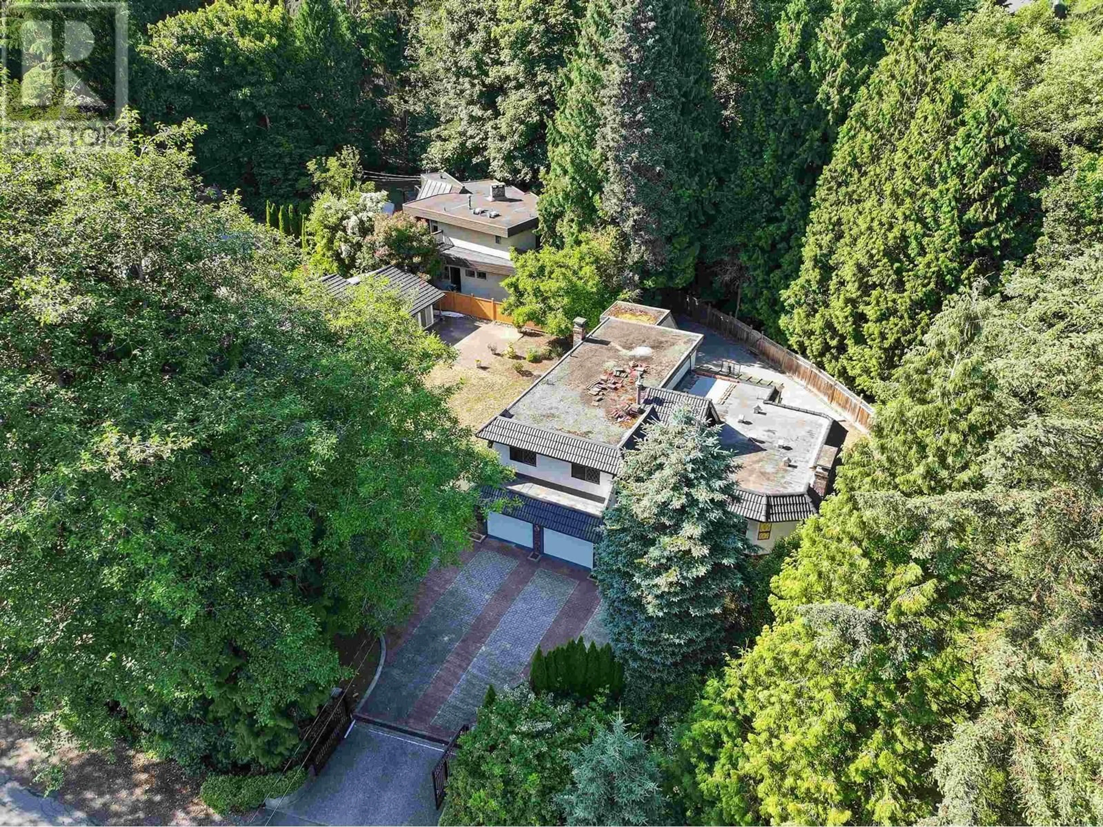 A pic from outside/outdoor area/front of a property/back of a property/a pic from drone, forest/trees view for 755 WESTCOT ROAD, West Vancouver British Columbia V7S1N8