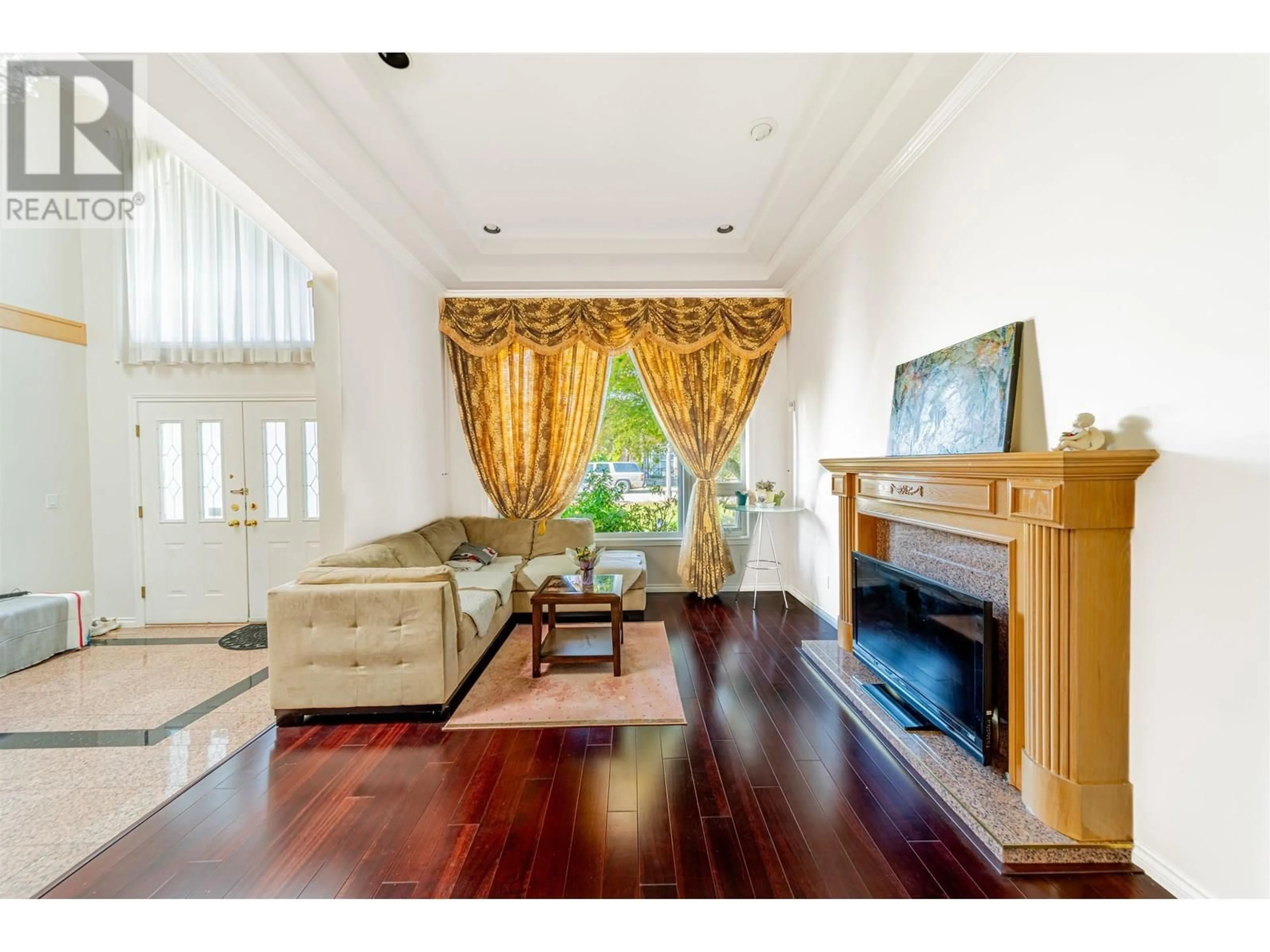 Living room with furniture, wood/laminate floor for 6660 LIVINGSTONE PLACE, Richmond British Columbia V7C5N1