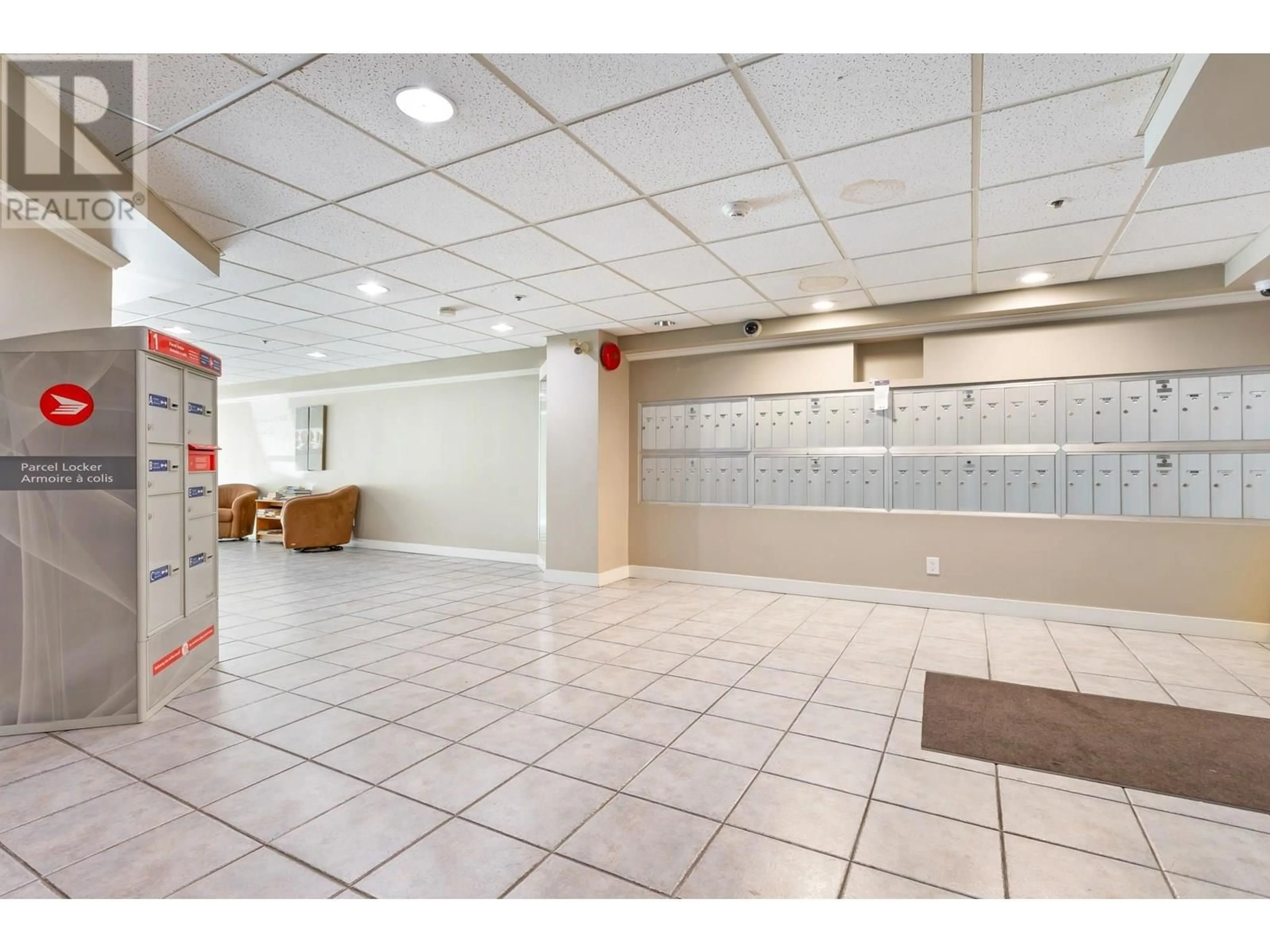 Indoor foyer for 207 - 11595 FRASER STREET, Maple Ridge British Columbia V2X0X7
