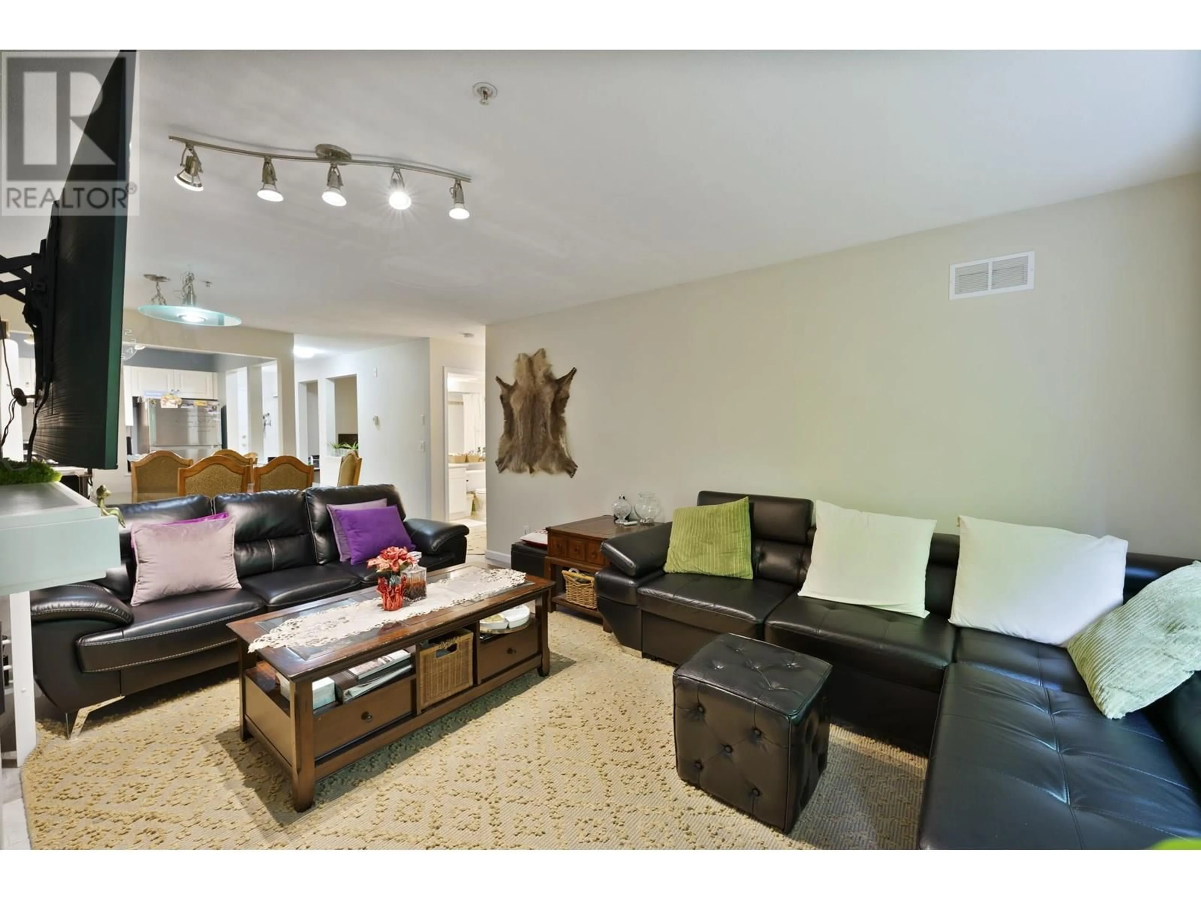 Living room with furniture, unknown for 204 - 22233 RIVER ROAD, Maple Ridge British Columbia V2X3N7