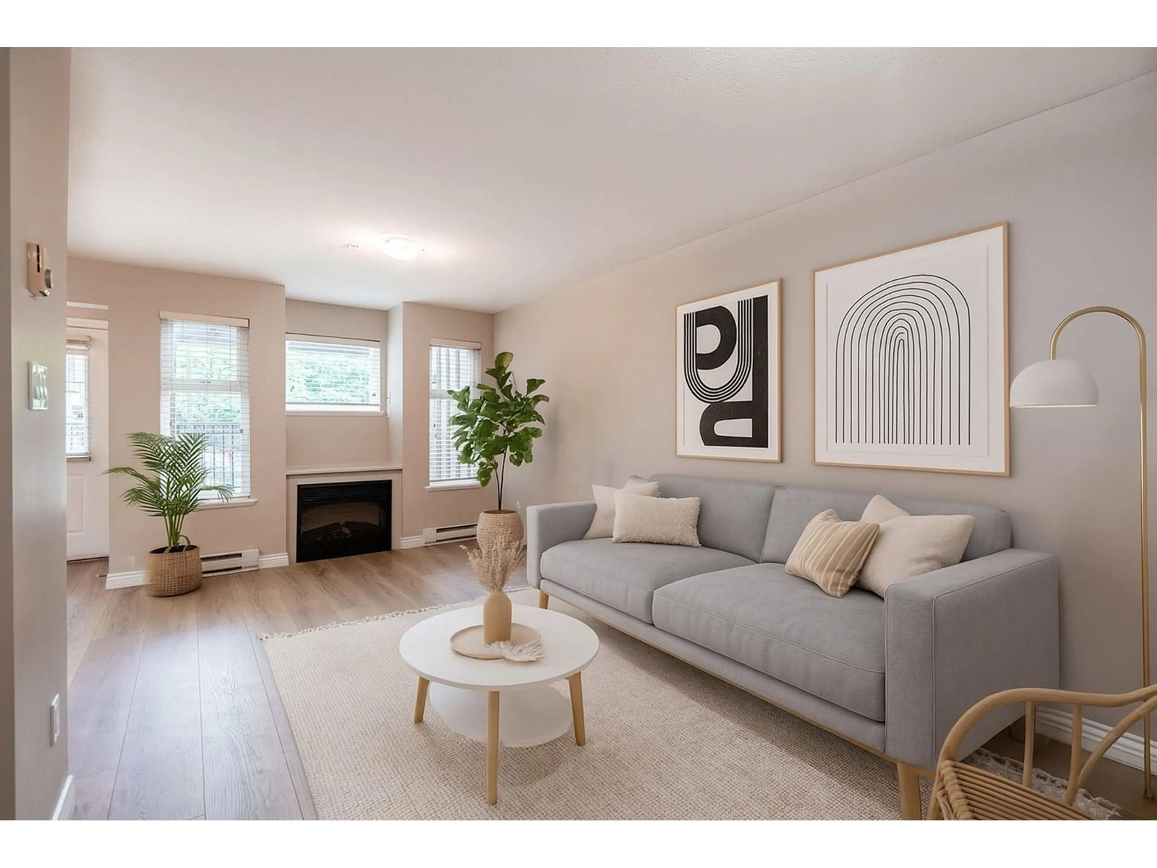Living room with furniture, wood/laminate floor for 113 - 10289 133, Surrey British Columbia V3T0B1