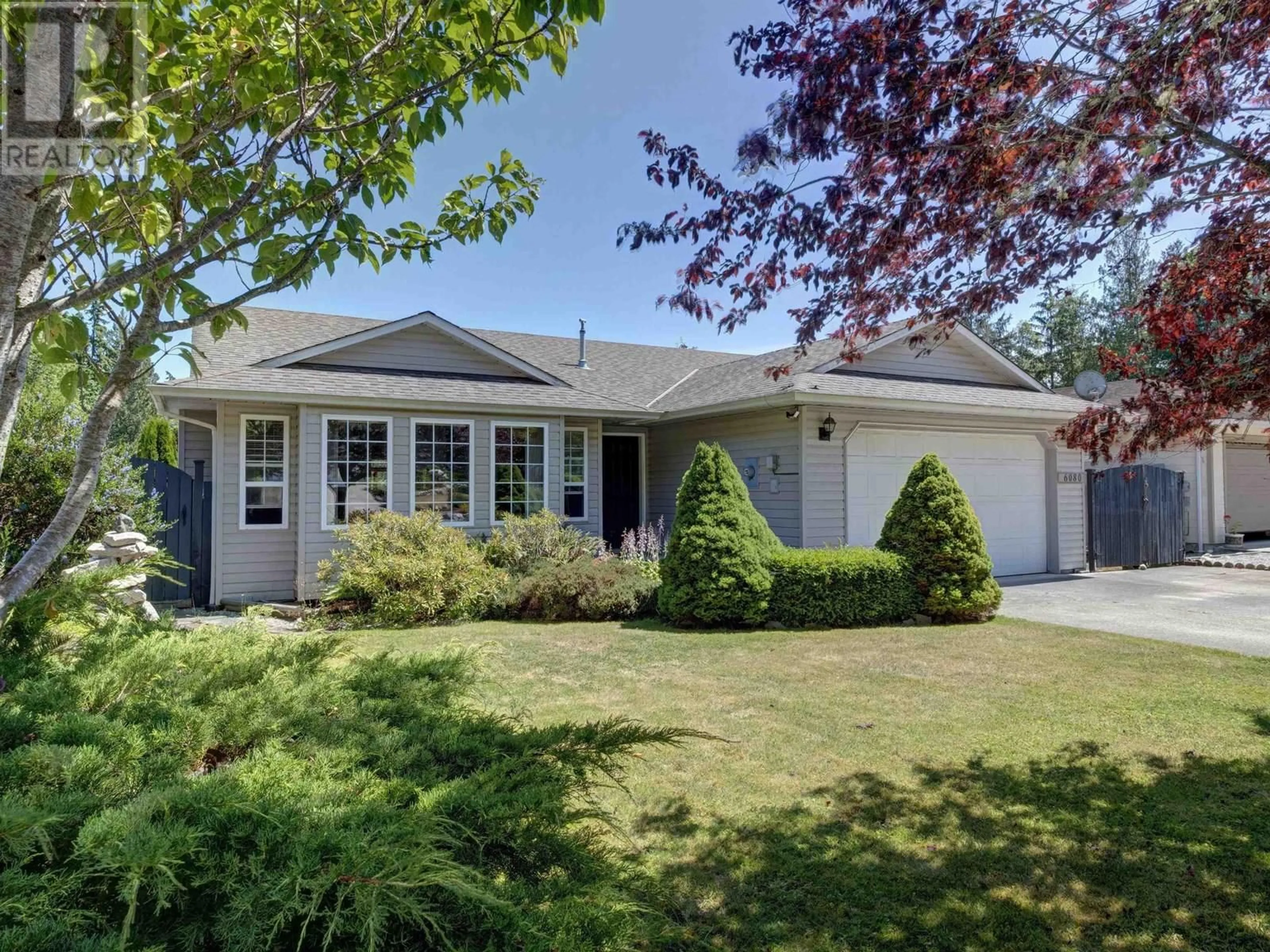 Home with vinyl exterior material, street for 6080 GALE AVENUE, Sechelt British Columbia V7Z0P9