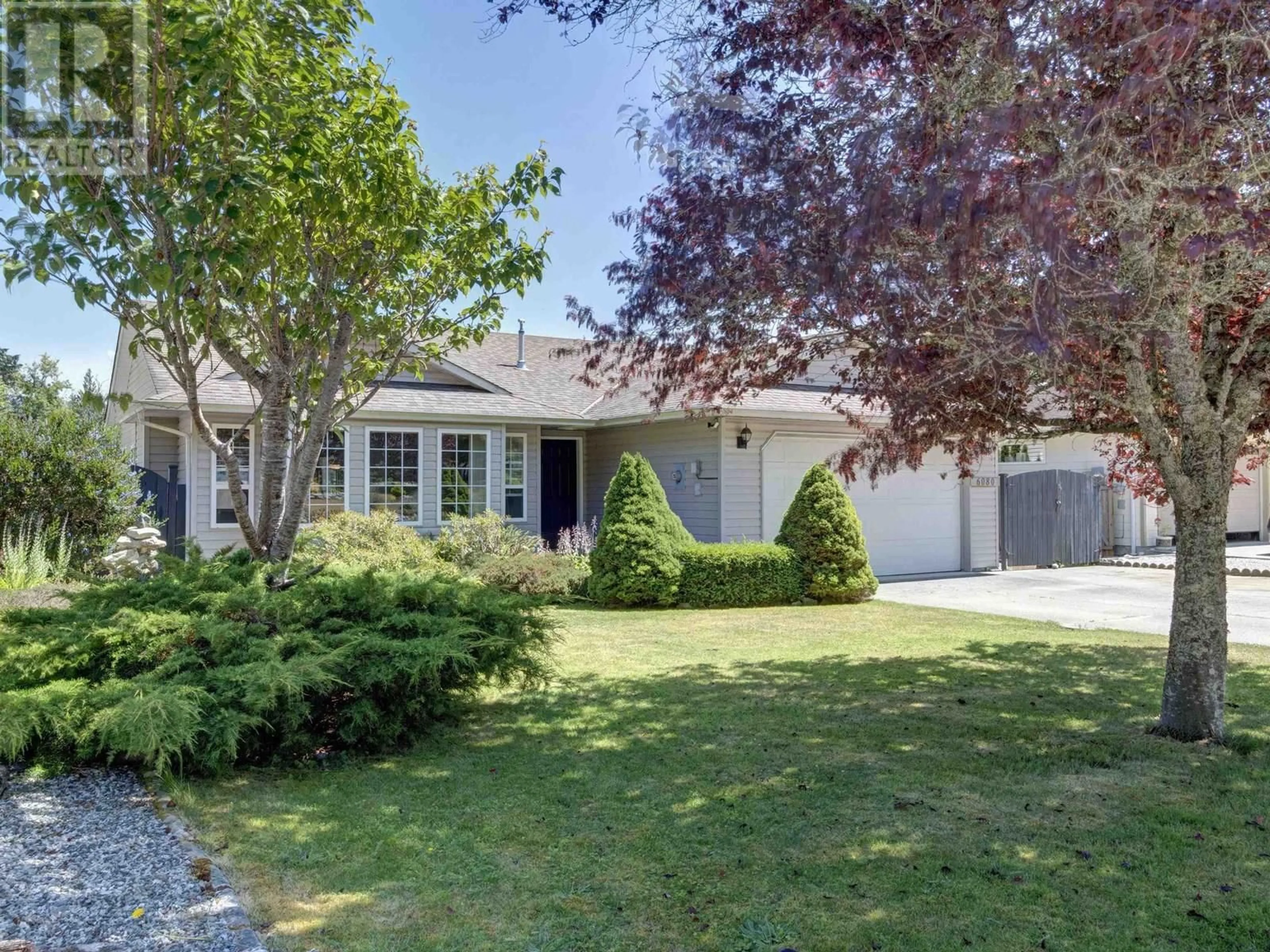 A pic from outside/outdoor area/front of a property/back of a property/a pic from drone, street for 6080 GALE AVENUE, Sechelt British Columbia V7Z0P9