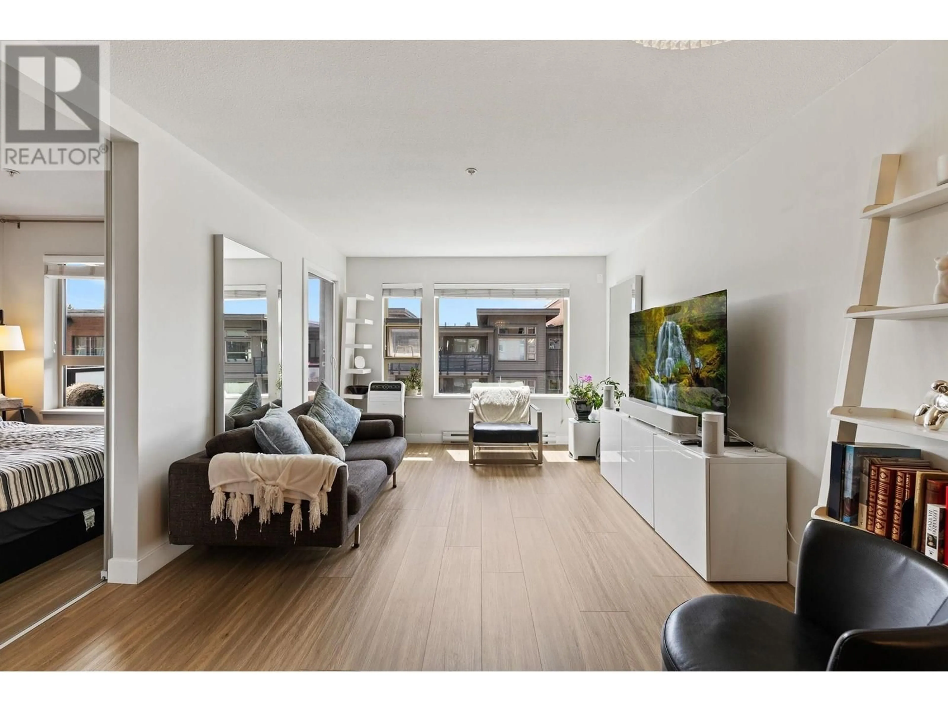 Living room with furniture, unknown for 412 - 1679 LLOYD AVENUE, North Vancouver British Columbia V7P0A9