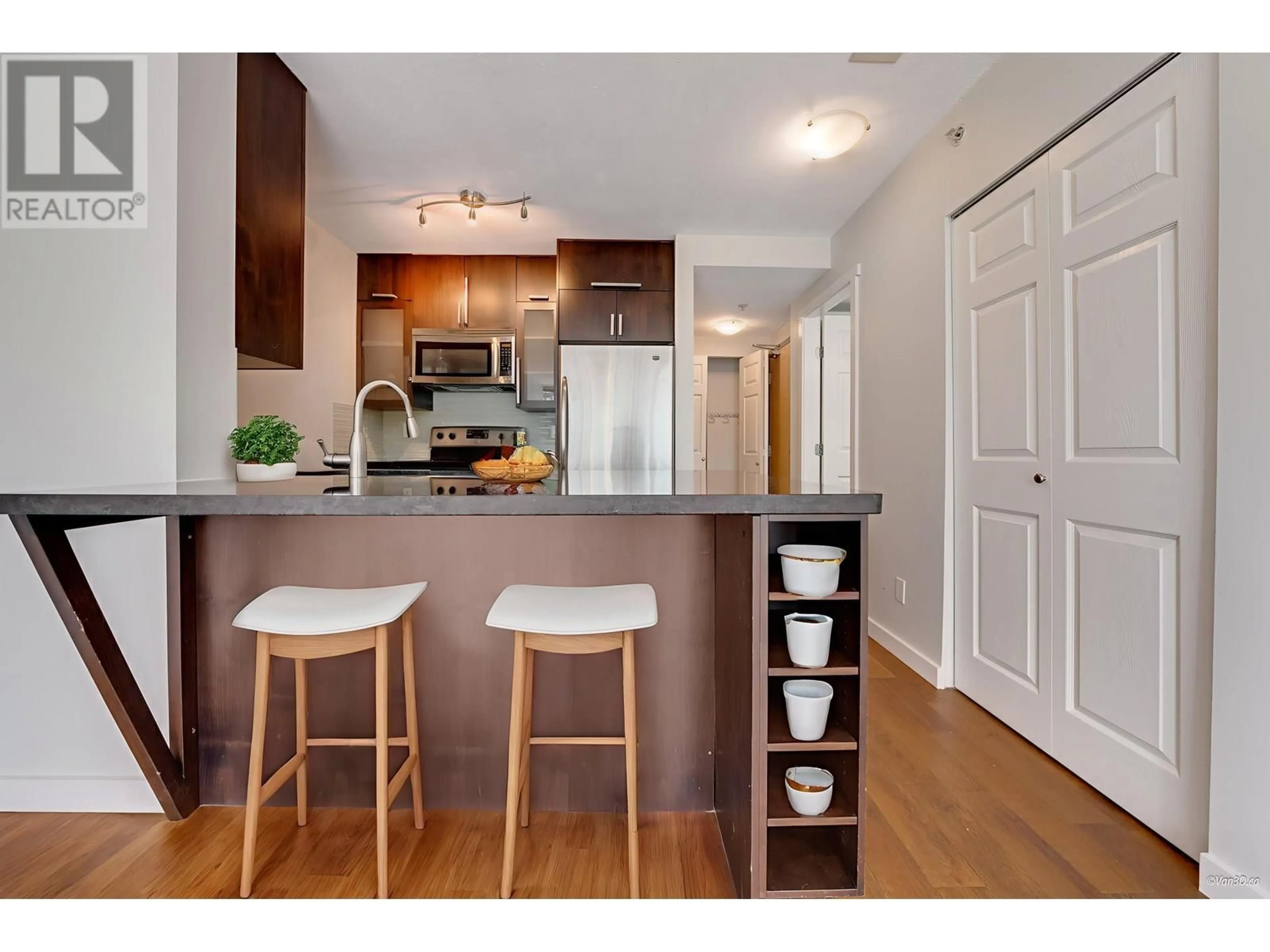 Open concept kitchen, wood/laminate floor for 701 - 1420 GEORGIA STREET, Vancouver British Columbia V6G3K4