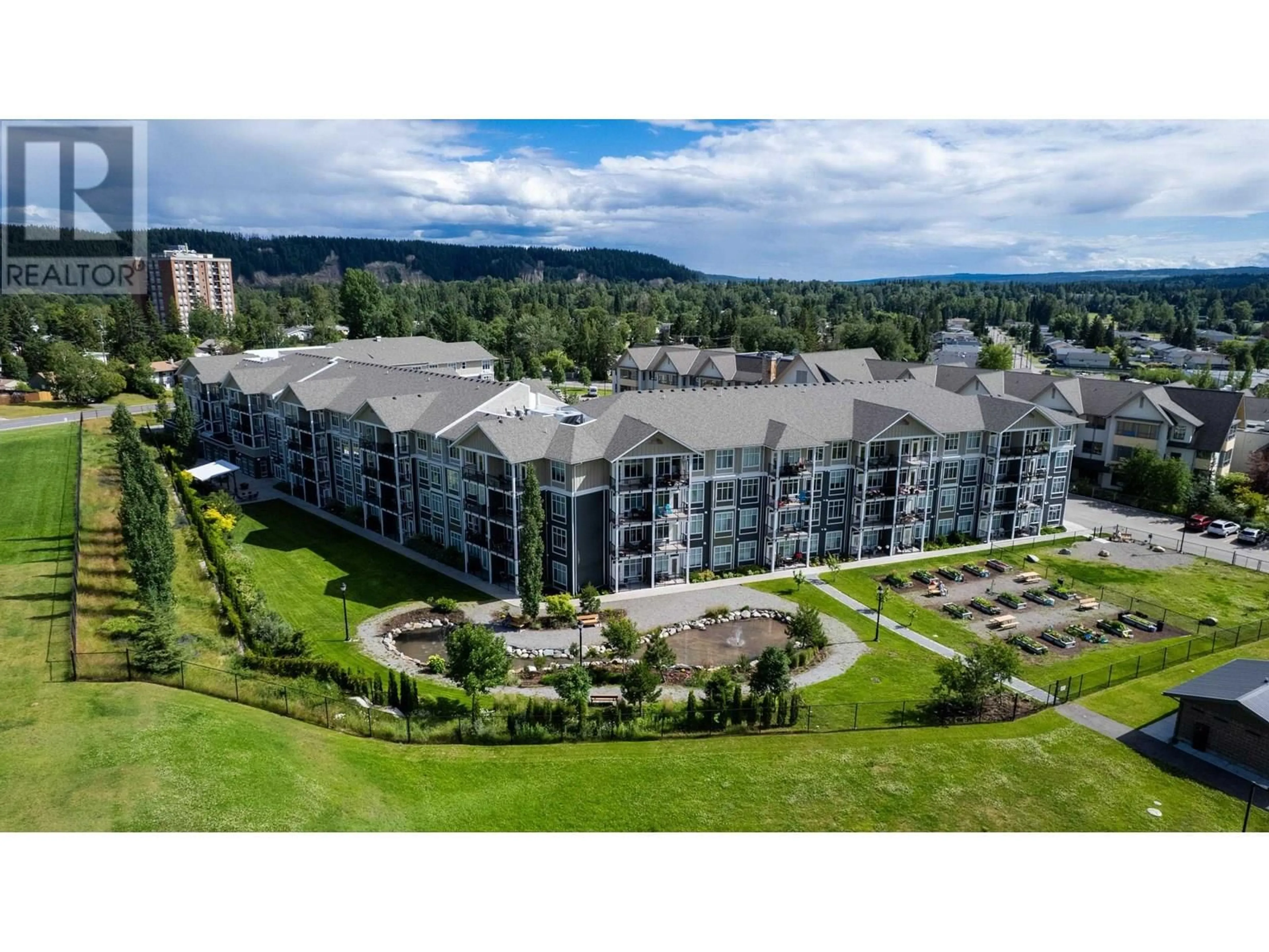 A pic from outside/outdoor area/front of a property/back of a property/a pic from drone, mountain view for 242 - 1444 20TH AVENUE, Prince George British Columbia V2L0C9