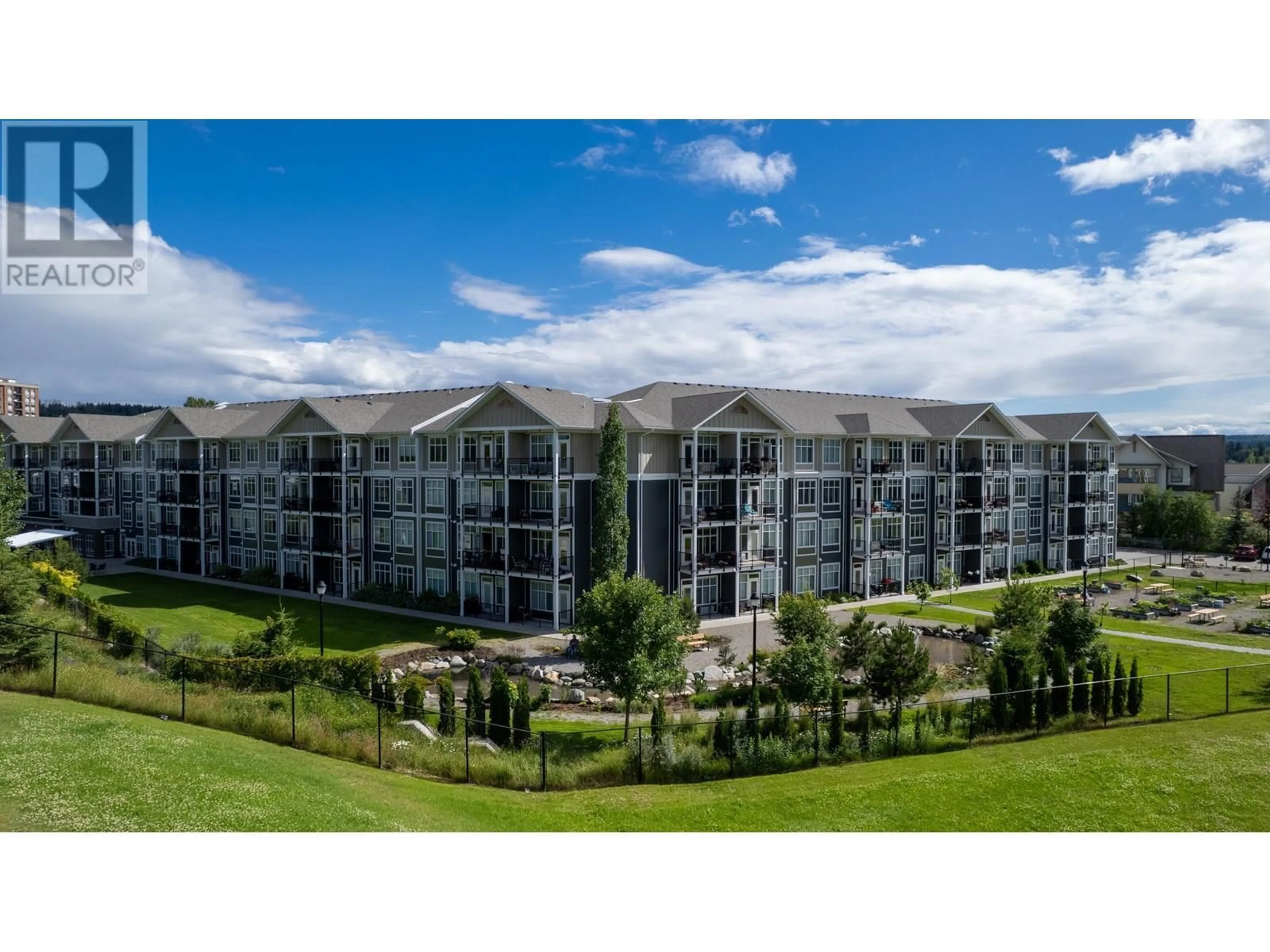 A pic from outside/outdoor area/front of a property/back of a property/a pic from drone, mountain view for 242 - 1444 20TH AVENUE, Prince George British Columbia V2L0C9