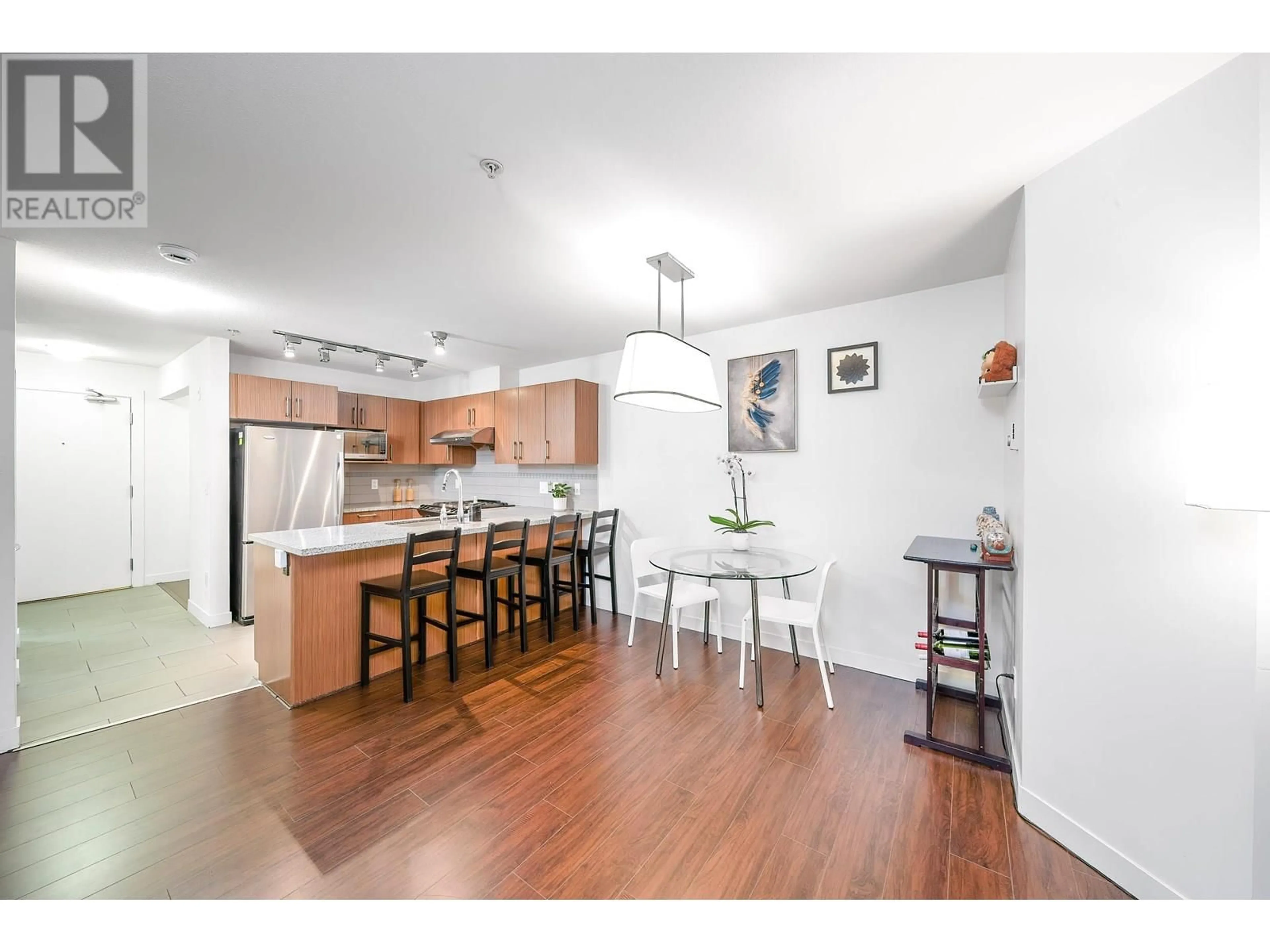 Open concept kitchen, wood/laminate floor for 114 - 6828 ECKERSLEY ROAD, Richmond British Columbia V6Y0E8