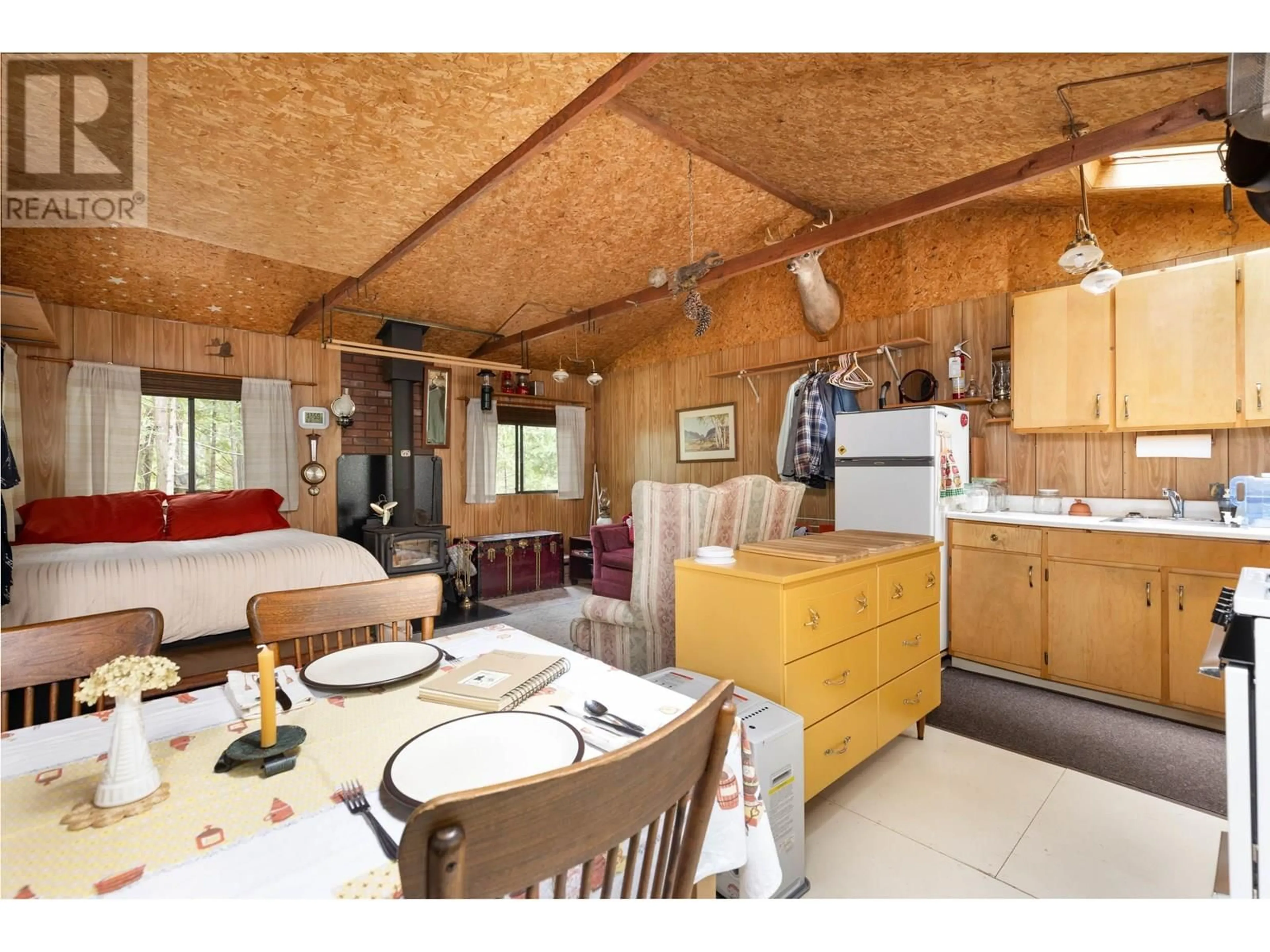Open concept kitchen, wood/laminate floor for 9540 PEMBERTON PORTAGE ROAD, Pemberton British Columbia V0N2L1