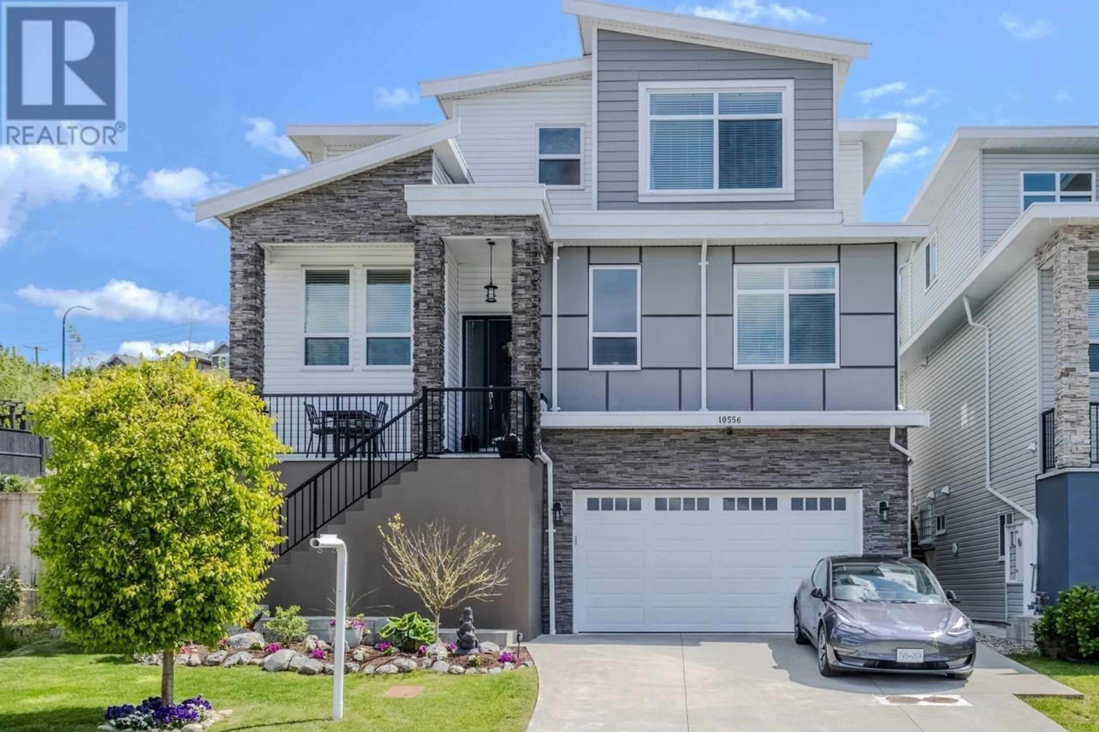 Home with vinyl exterior material, street for 10556 MCVEETY STREET, Maple Ridge British Columbia V2W0K3
