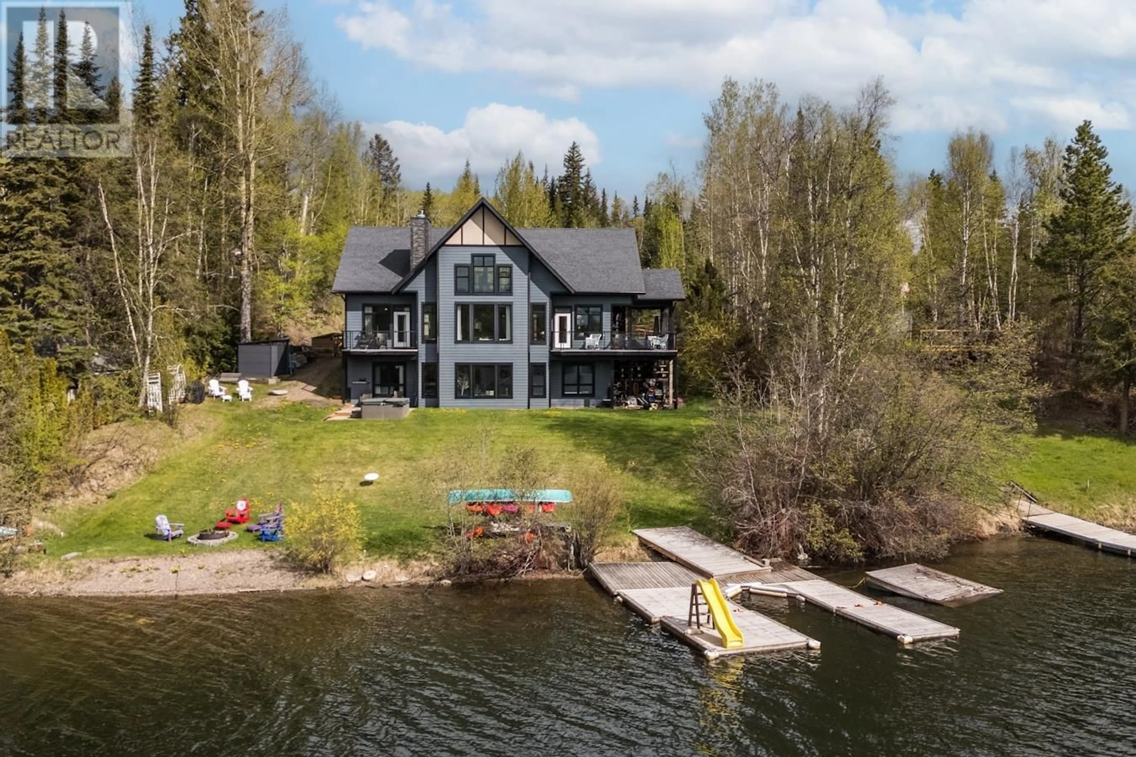 A pic from outside/outdoor area/front of a property/back of a property/a pic from drone, water/lake/river/ocean view for 27575 NESS LAKE ROAD, Prince George British Columbia V2K5N5