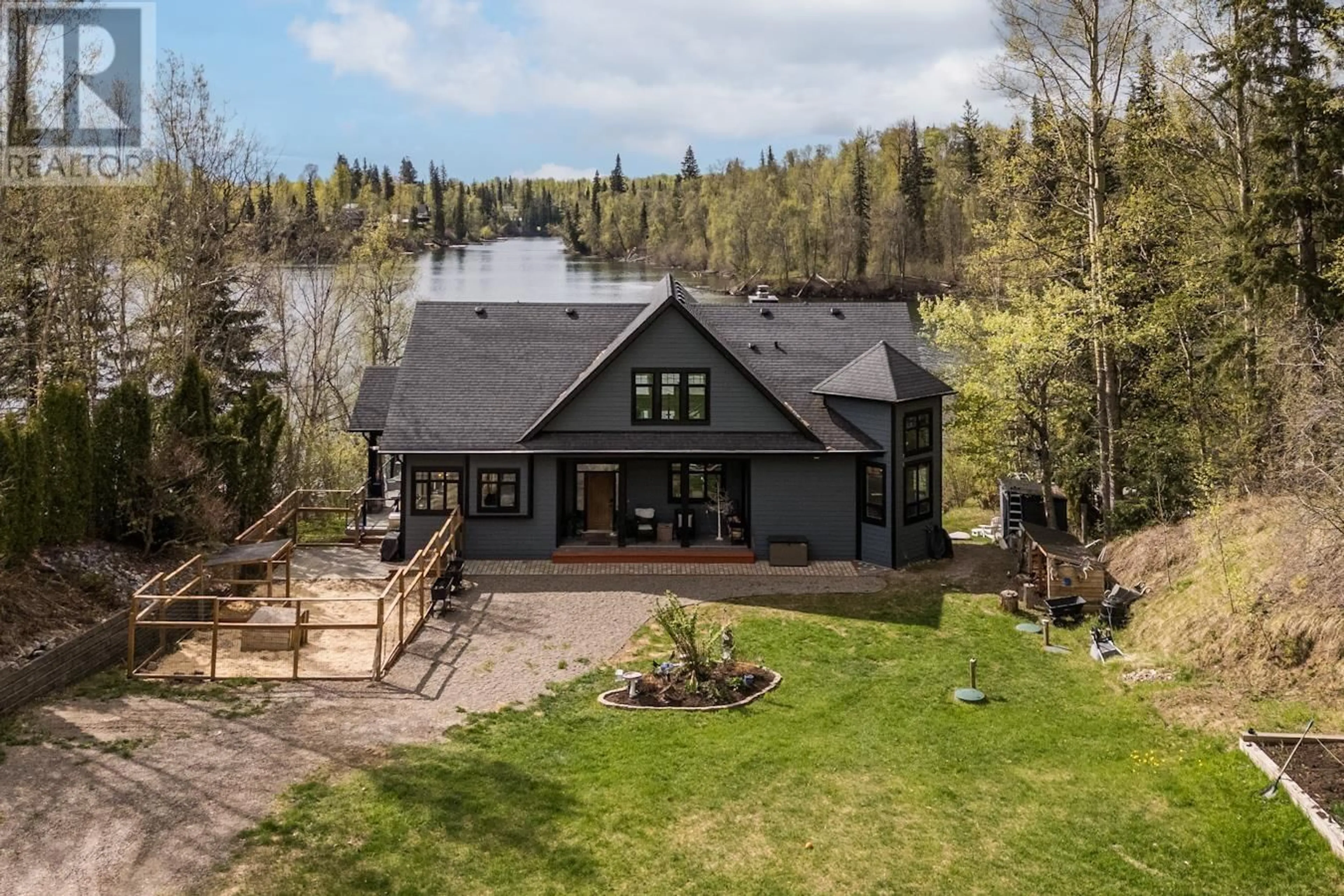A pic from outside/outdoor area/front of a property/back of a property/a pic from drone, water/lake/river/ocean view for 27575 NESS LAKE ROAD, Prince George British Columbia V2K5N5