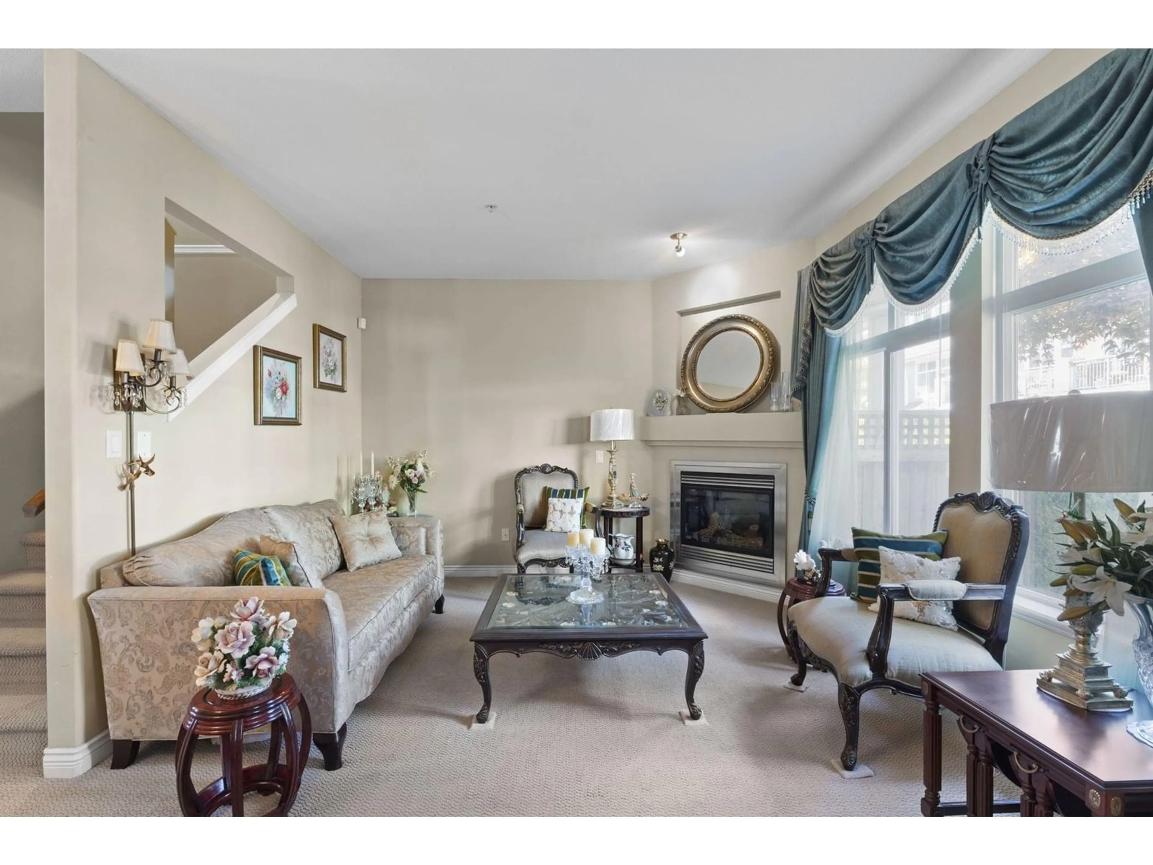 Living room with furniture, carpet floor for 104 - 20449 66, Langley British Columbia V2Y3C1