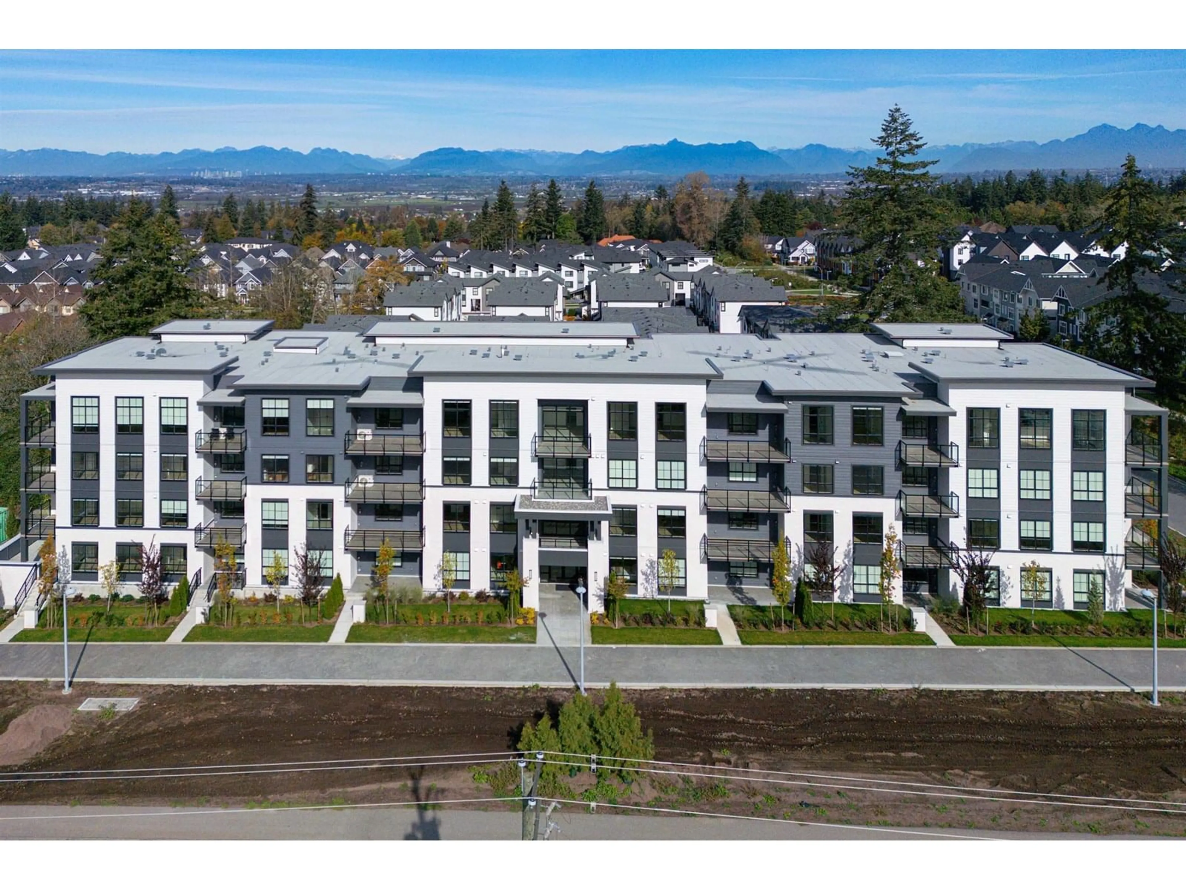 A pic from outside/outdoor area/front of a property/back of a property/a pic from drone, mountain view for 110 - 2425 166, Surrey British Columbia V3Z1K7