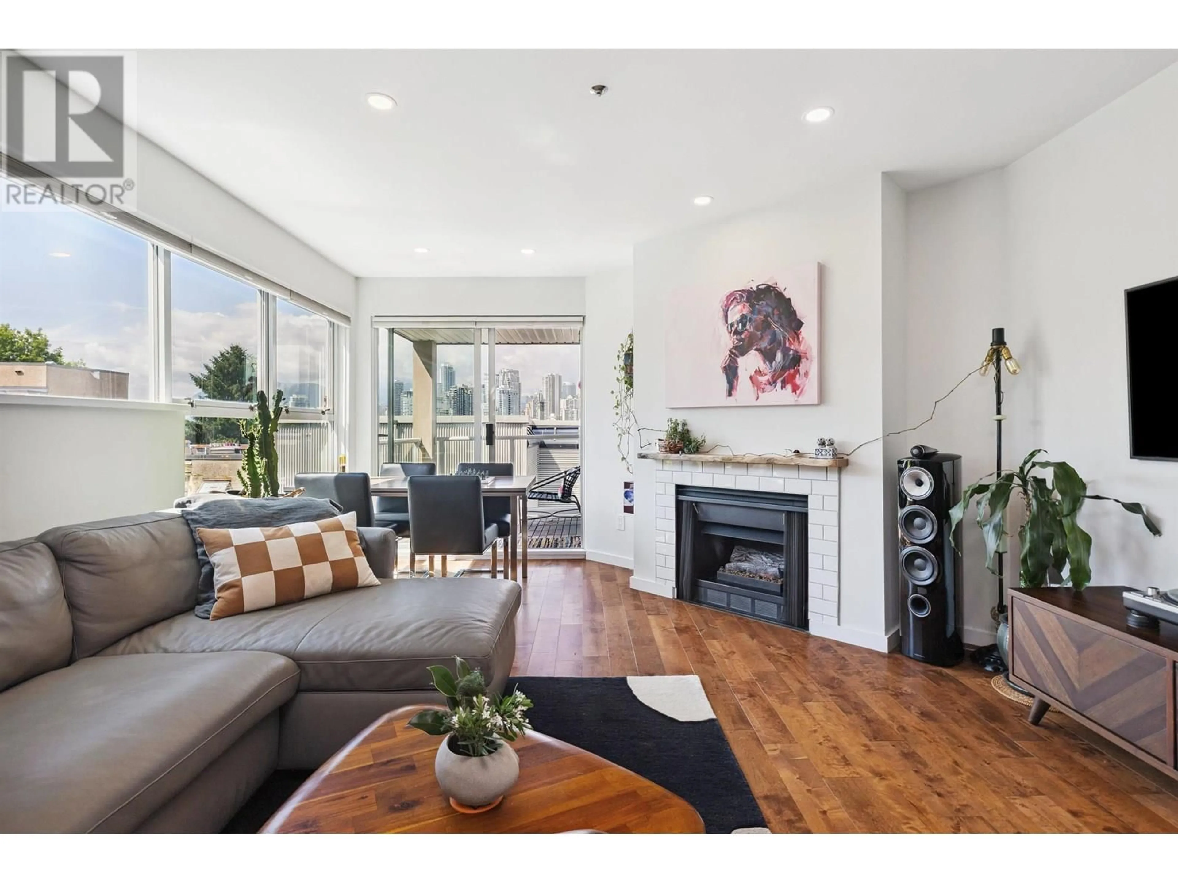 Living room with furniture, wood/laminate floor for 105 - 953 8TH AVENUE, Vancouver British Columbia V5Z1E4