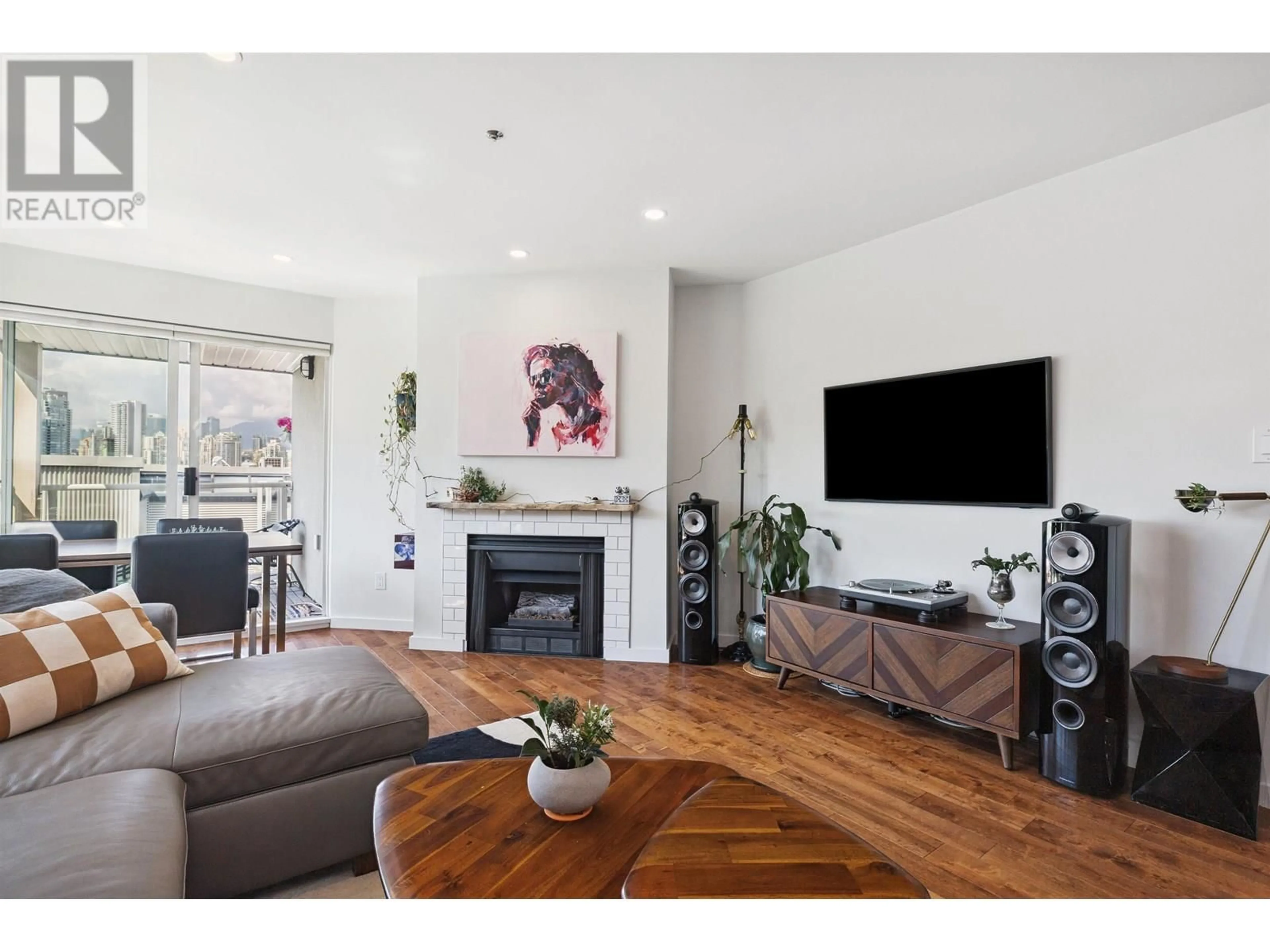 Living room with furniture, wood/laminate floor for 105 - 953 8TH AVENUE, Vancouver British Columbia V5Z1E4