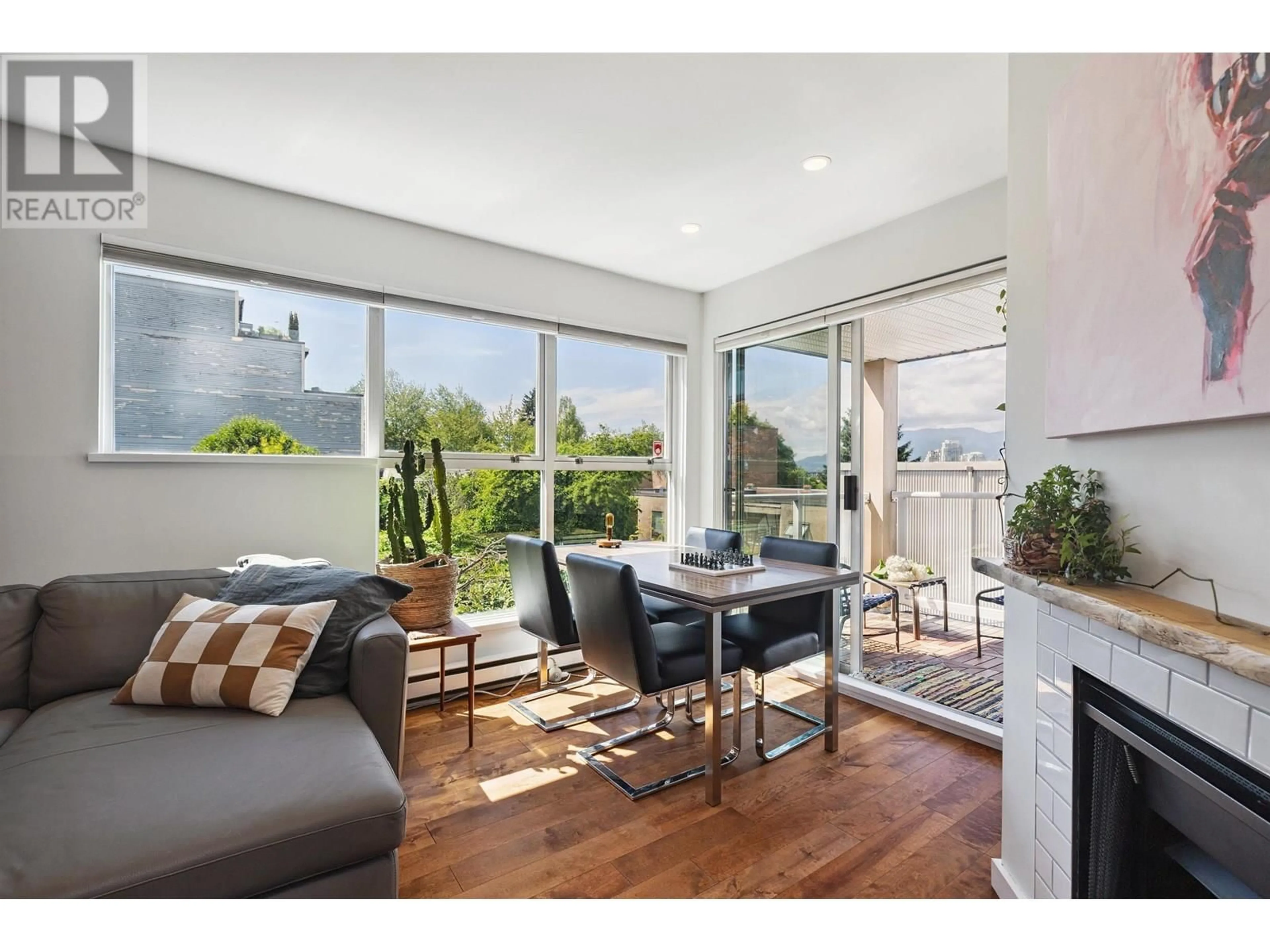Living room with furniture, wood/laminate floor for 105 - 953 8TH AVENUE, Vancouver British Columbia V5Z1E4