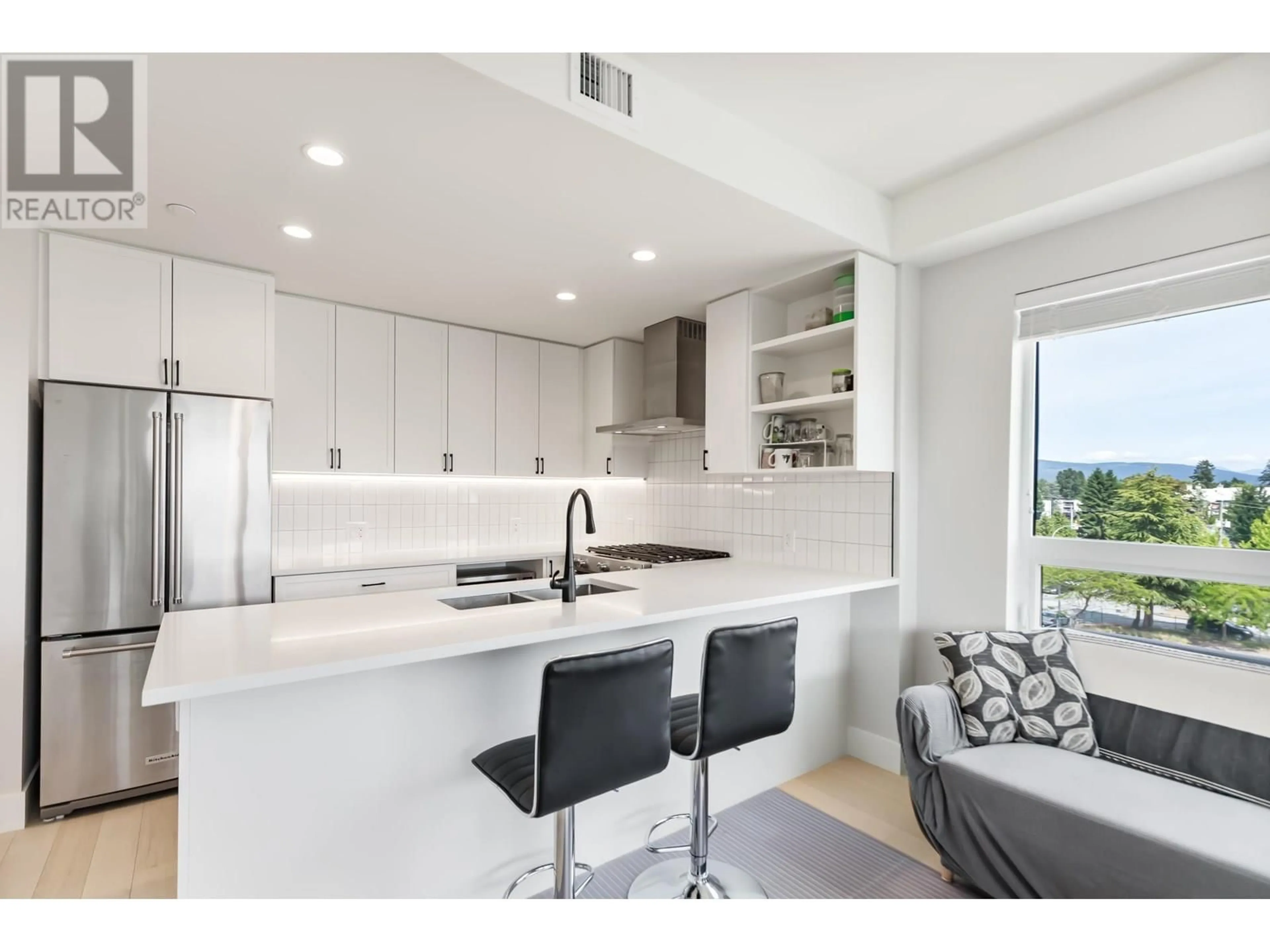 Open concept kitchen, ceramic/tile floor for 506 - 22226 BROWN AVENUE, Maple Ridge British Columbia V2X4R2