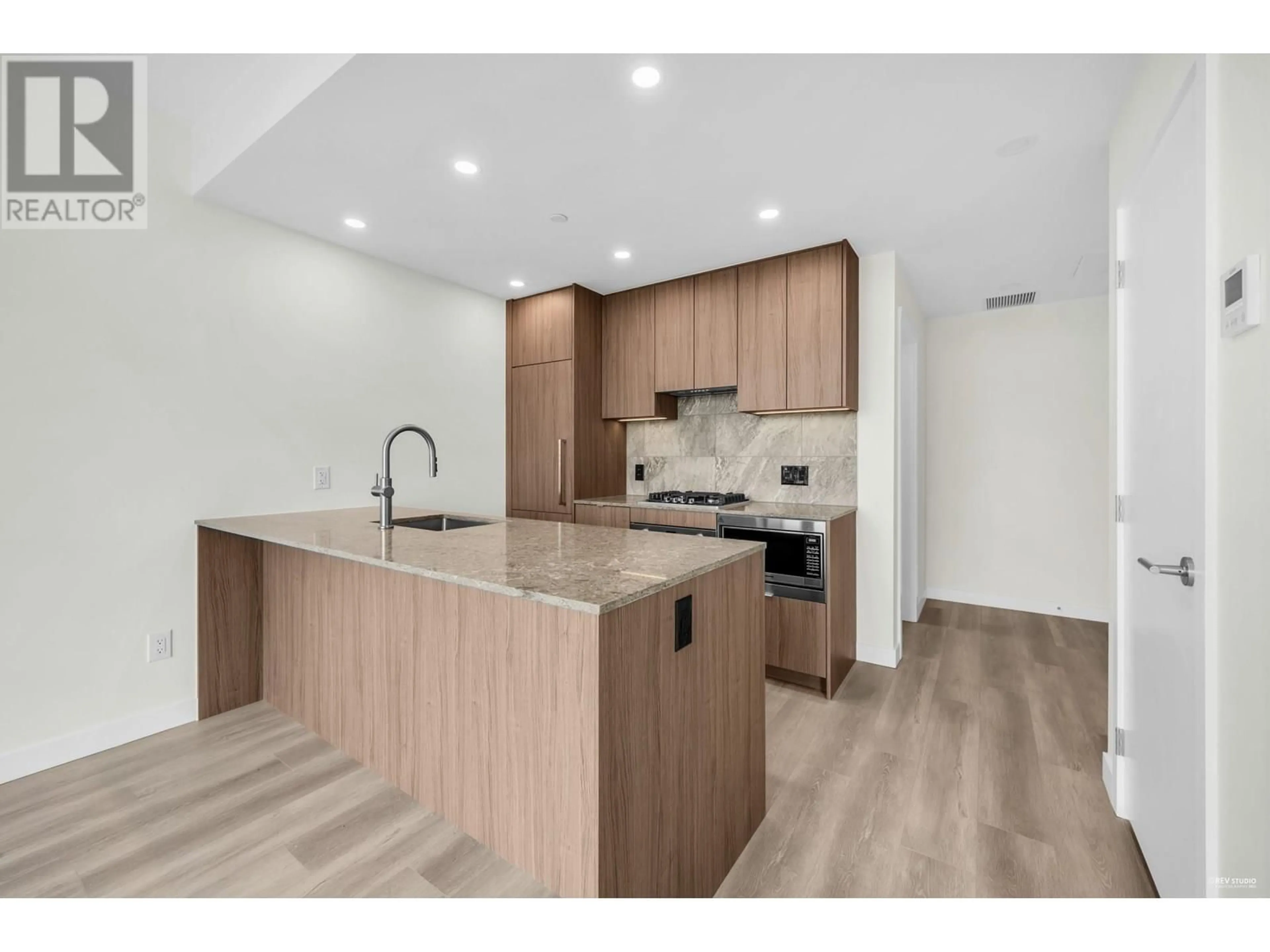 Open concept kitchen, wood/laminate floor for 1608 - 626 CLAREMONT STREET, Coquitlam British Columbia V3J3T4