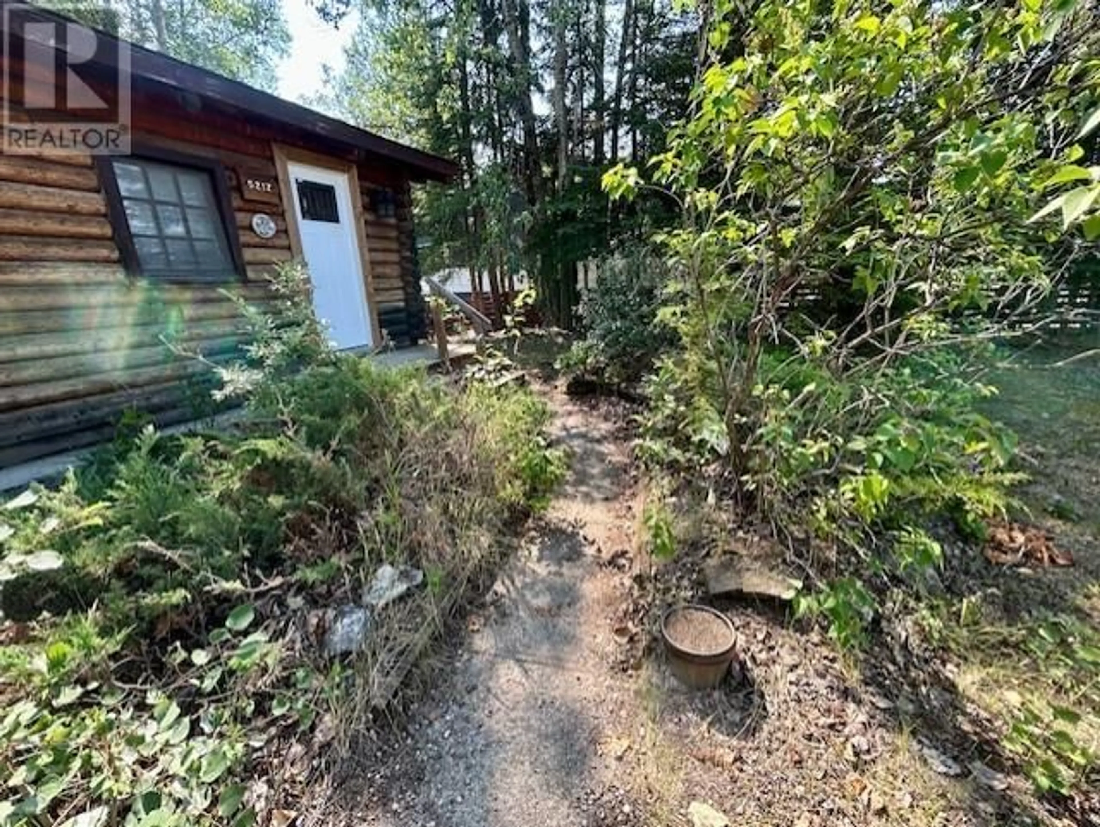 A pic from outside/outdoor area/front of a property/back of a property/a pic from drone, forest/trees view for 5212 43 STREET, Fort Nelson British Columbia V0C1R0