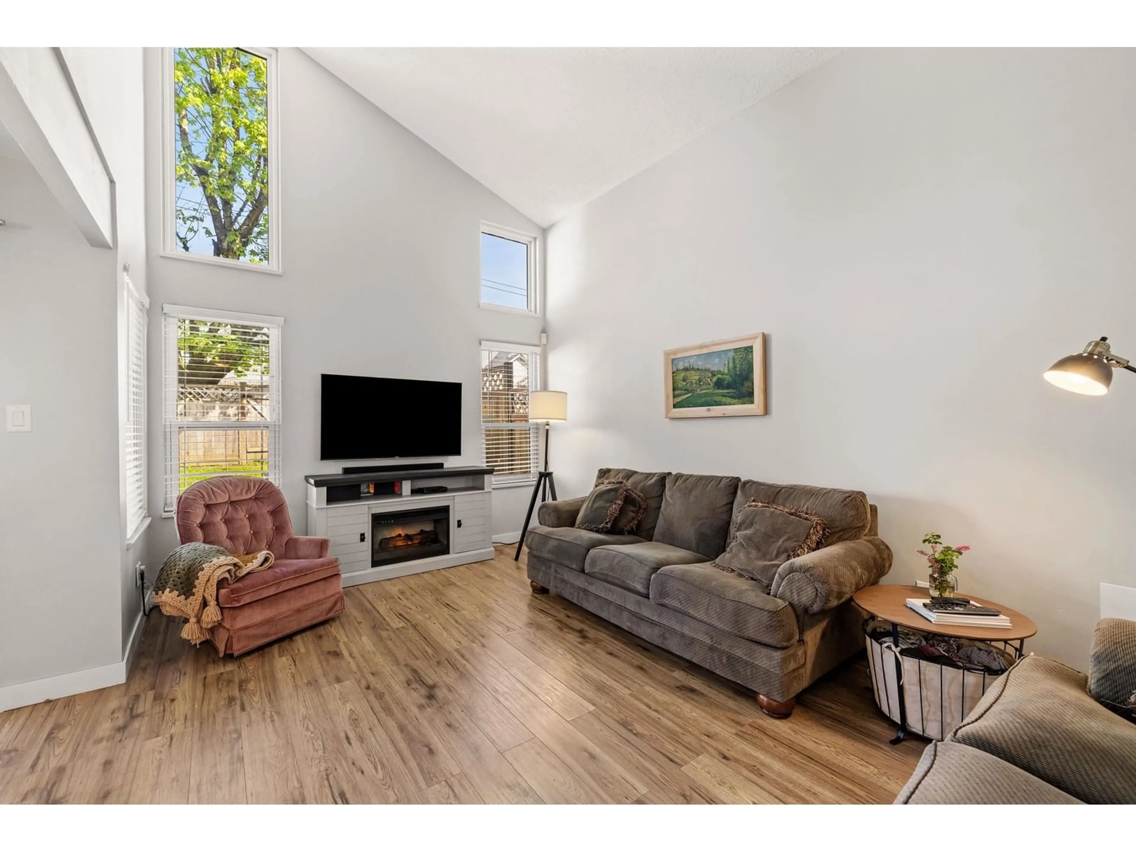 Living room with furniture, wood/laminate floor for 408 BRUNEAU, Langley British Columbia V4W3K9