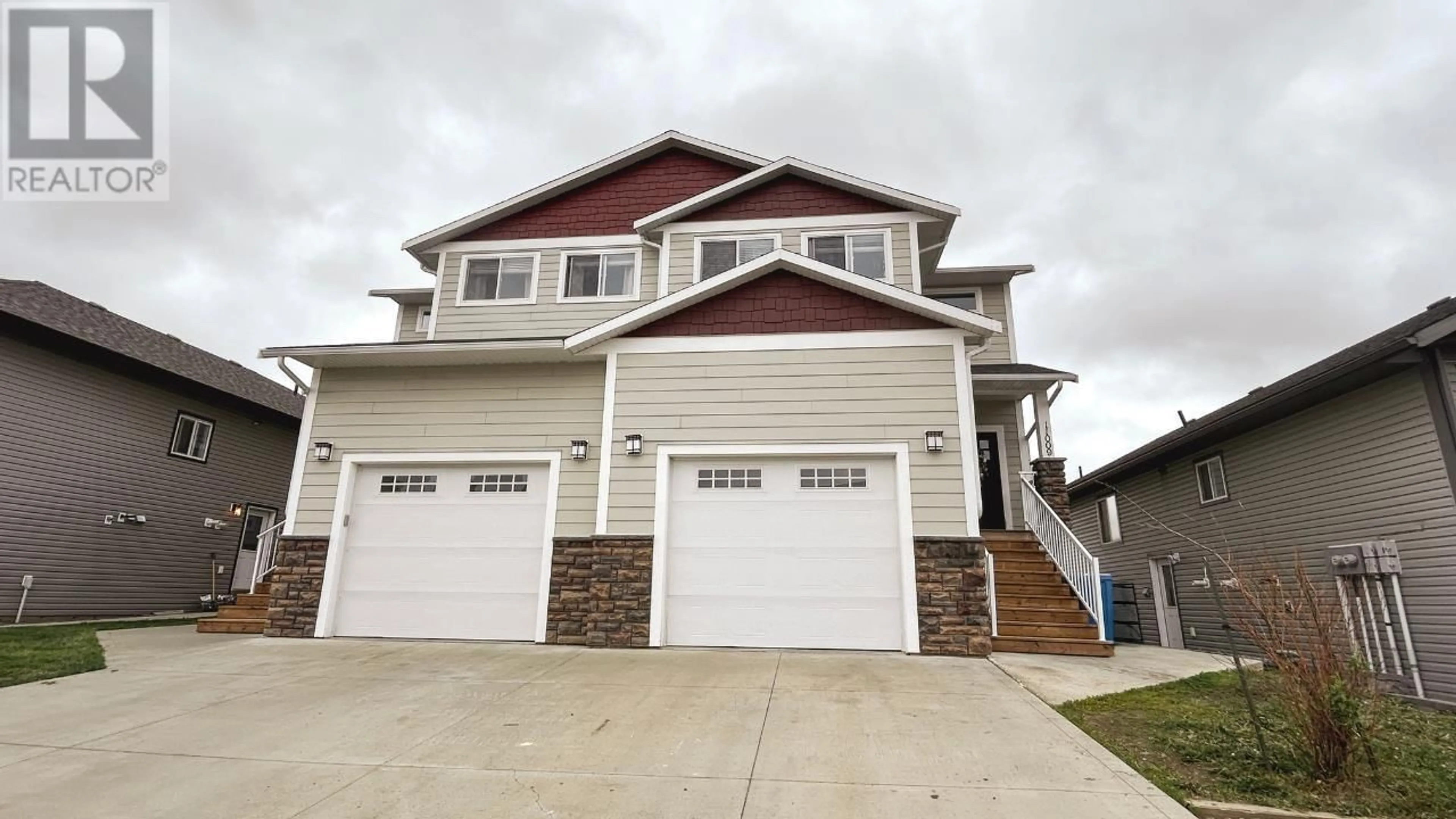 Home with vinyl exterior material, street for 11009 104A AVENUE, Fort St. John British Columbia V1J0J3