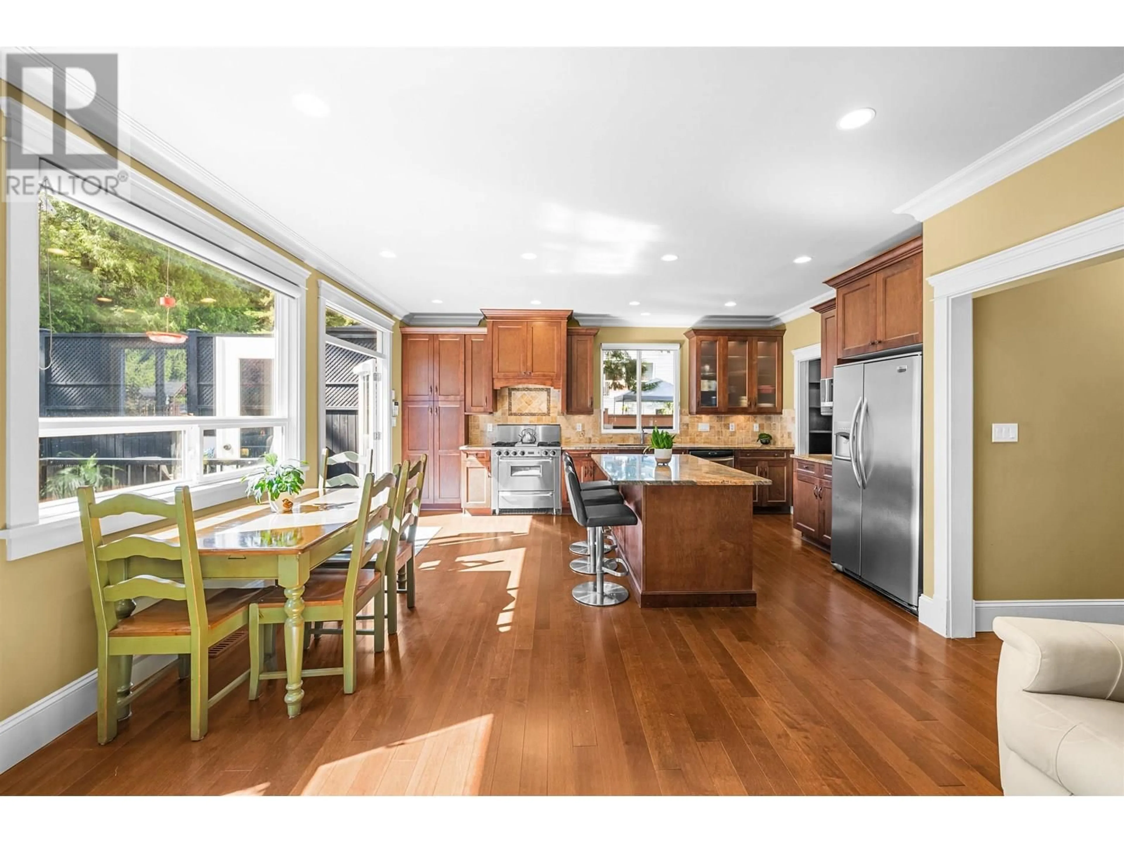 Open concept kitchen, wood/laminate floor for 4375 UNDERWOOD AVENUE, North Vancouver British Columbia V7K2R8