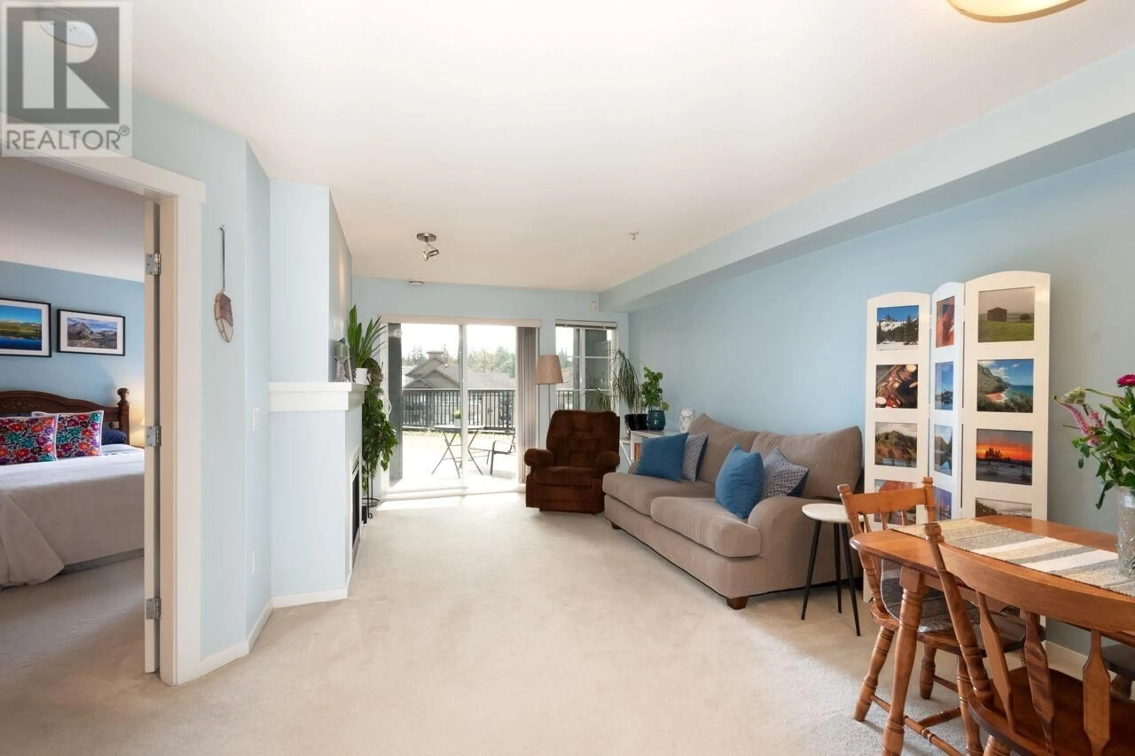 Living room with furniture, unknown for 213 - 9098 HALSTON COURT, Burnaby British Columbia V3N0A6