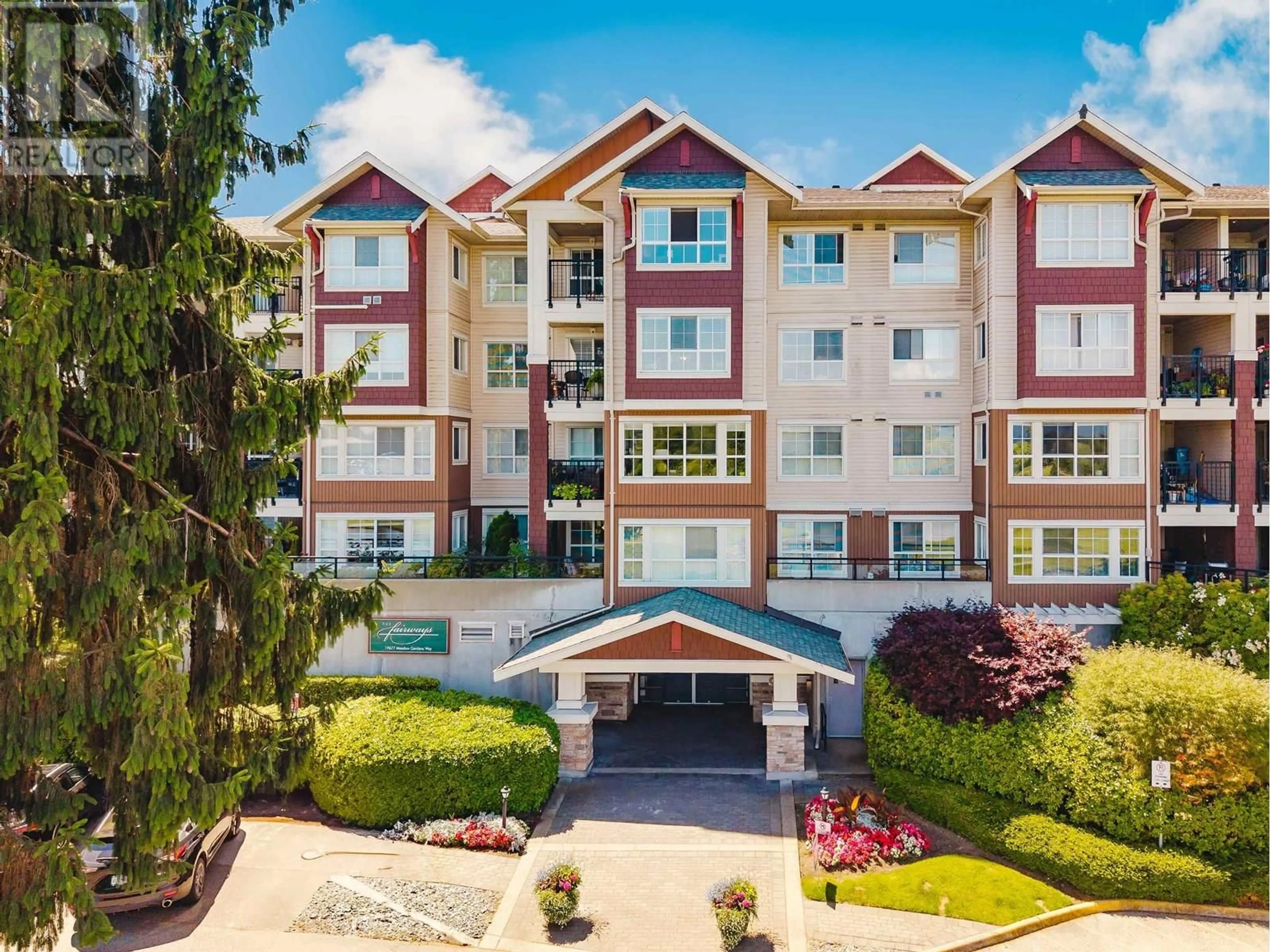 A pic from outside/outdoor area/front of a property/back of a property/a pic from drone, building for 205 - 19677 MEADOW GARDENS WAY, Pitt Meadows British Columbia V3Y0A2