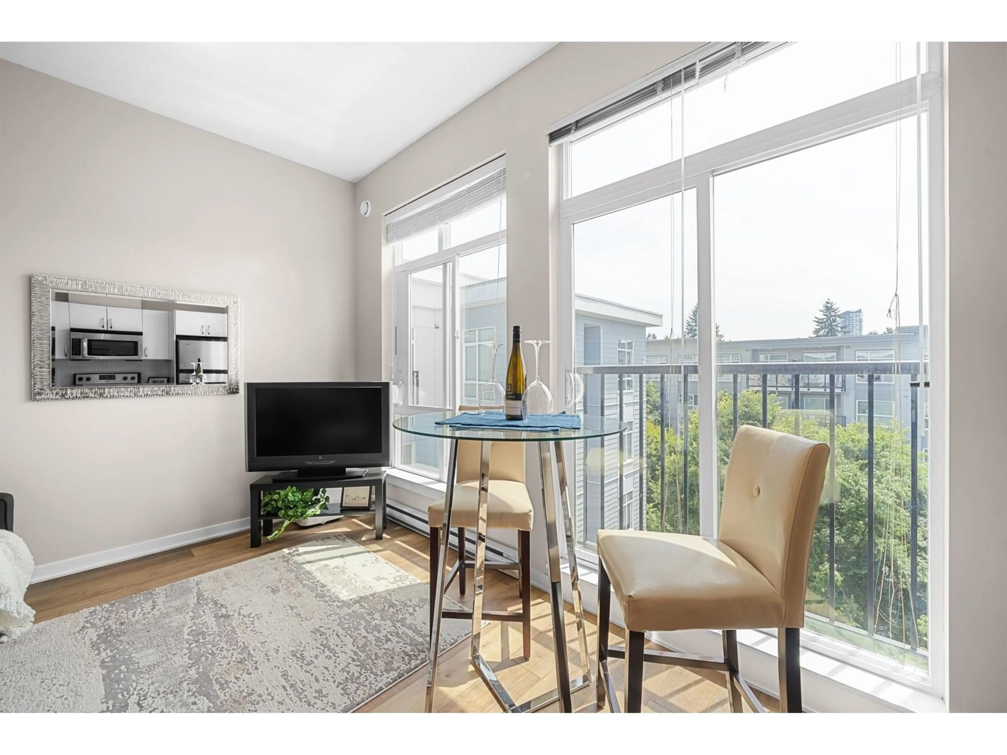 Living room with furniture, wood/laminate floor for 513 - 13728 108, Surrey British Columbia V3T0G2