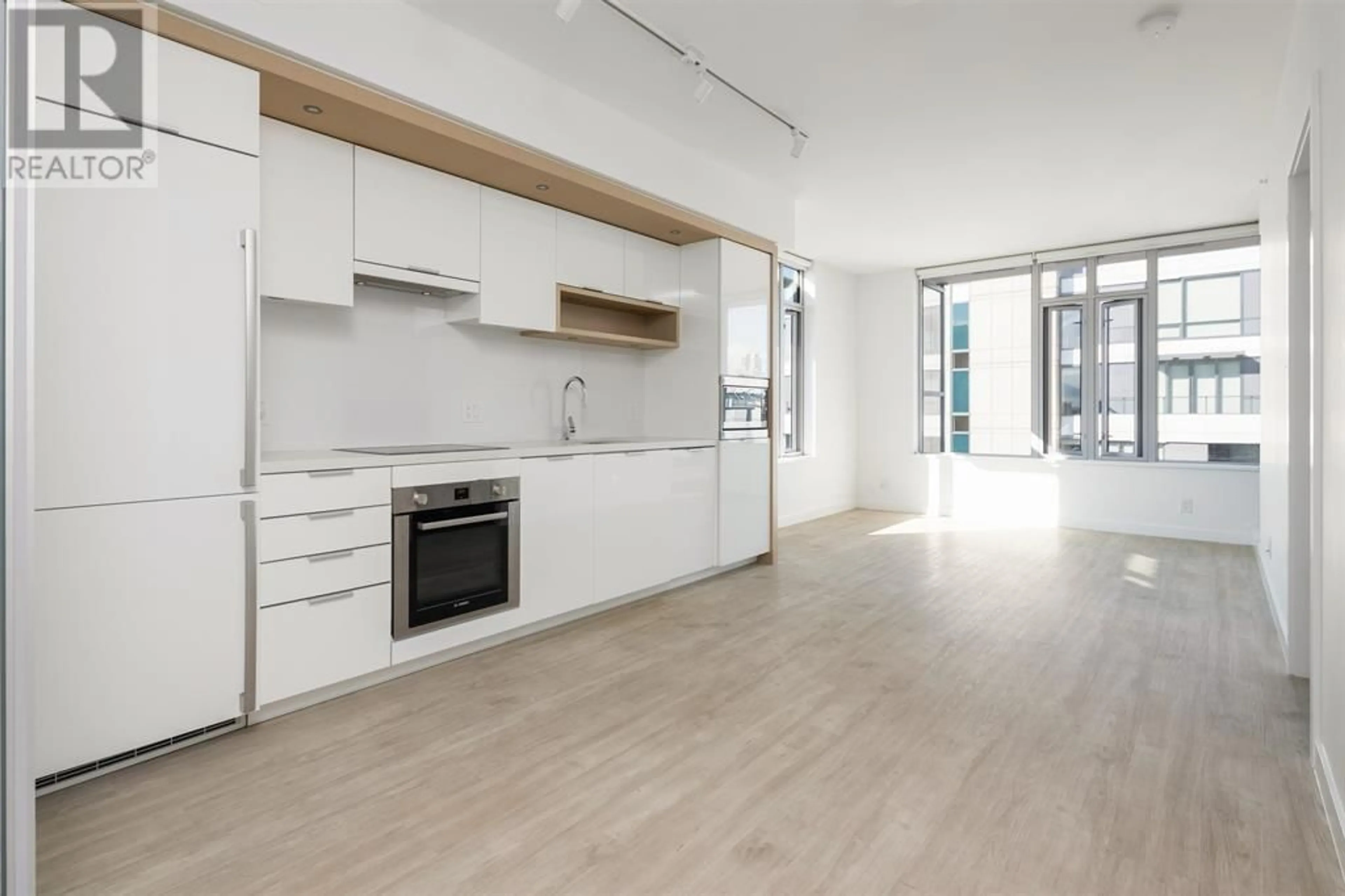 Open concept kitchen, wood/laminate floor for 1108 - 1661 QUEBEC STREET, Vancouver British Columbia V6A0H2