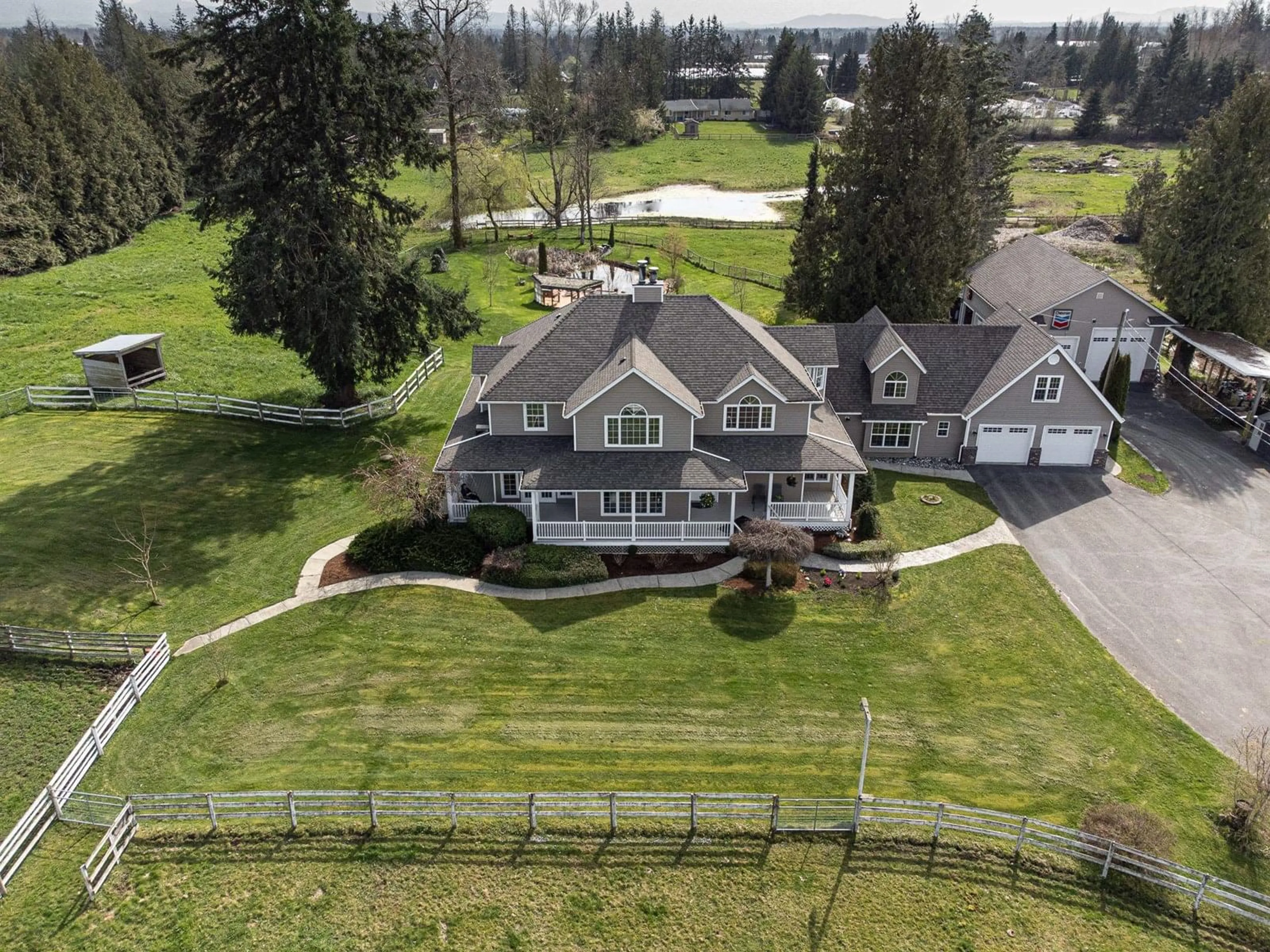 A pic from outside/outdoor area/front of a property/back of a property/a pic from drone, unknown for 24920 30, Langley British Columbia V4W1X9