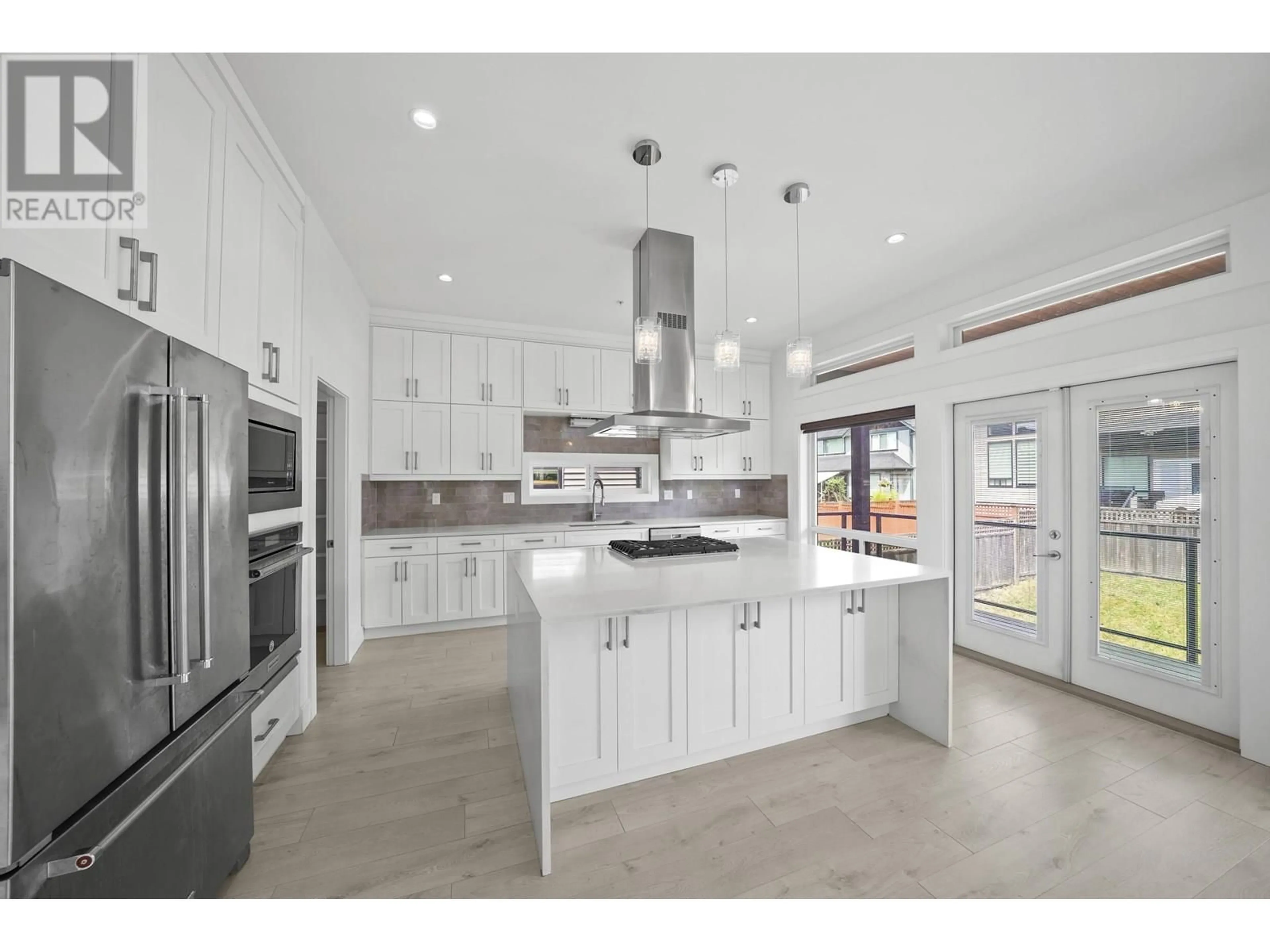 Open concept kitchen, ceramic/tile floor for 12400 201 STREET, Maple Ridge British Columbia V2X6A7
