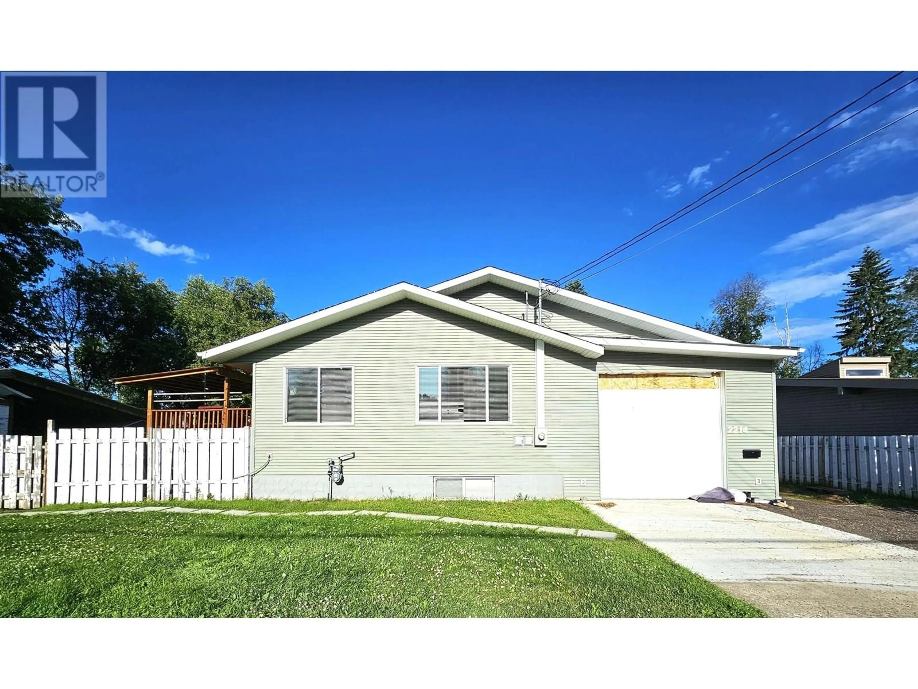 Home with vinyl exterior material, street for 2214 PINE STREET, Prince George British Columbia V2L1N1