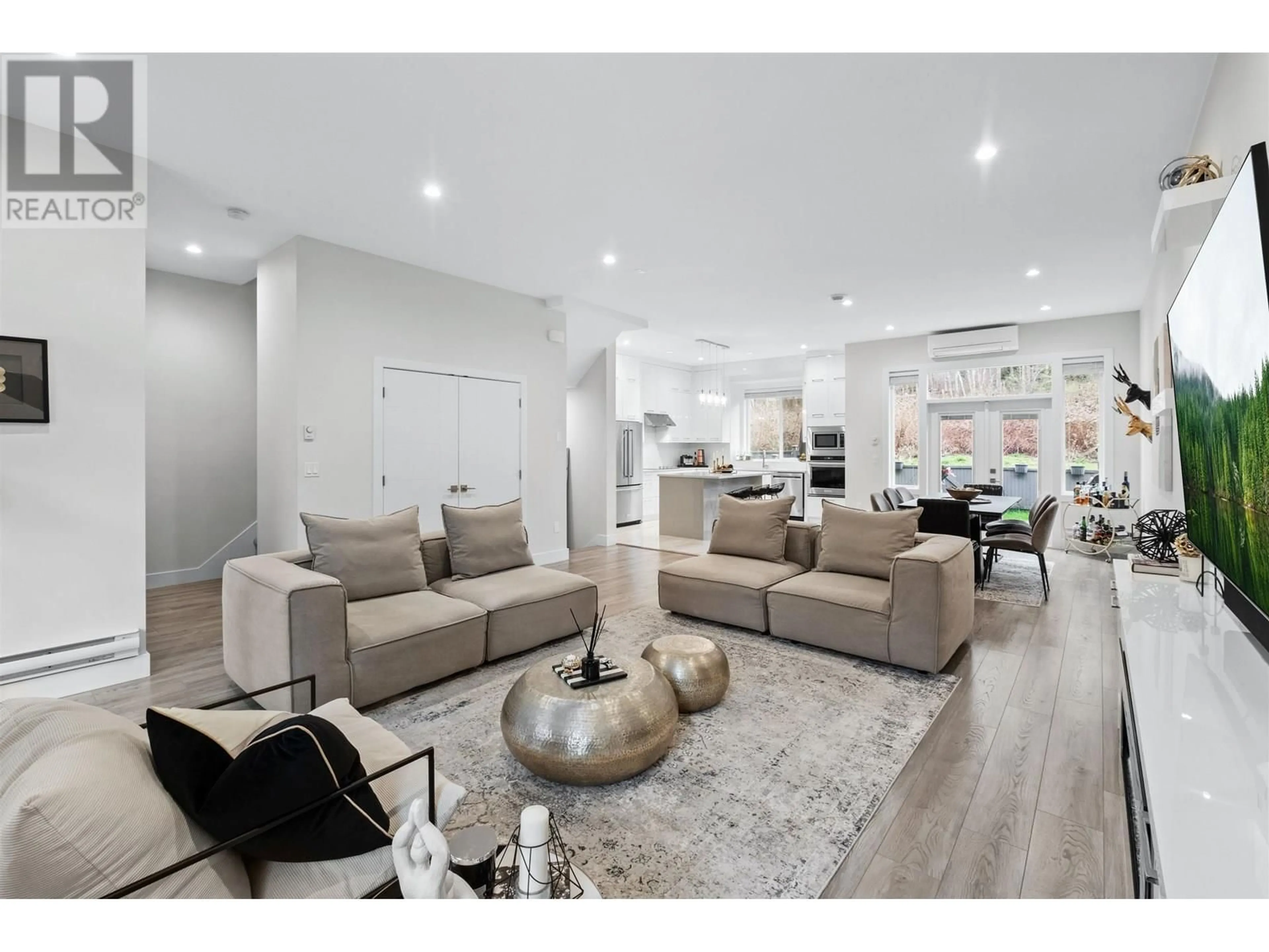 Living room with furniture, unknown for 102 - 3499 GISLASON AVENUE, Coquitlam British Columbia V3B0P8