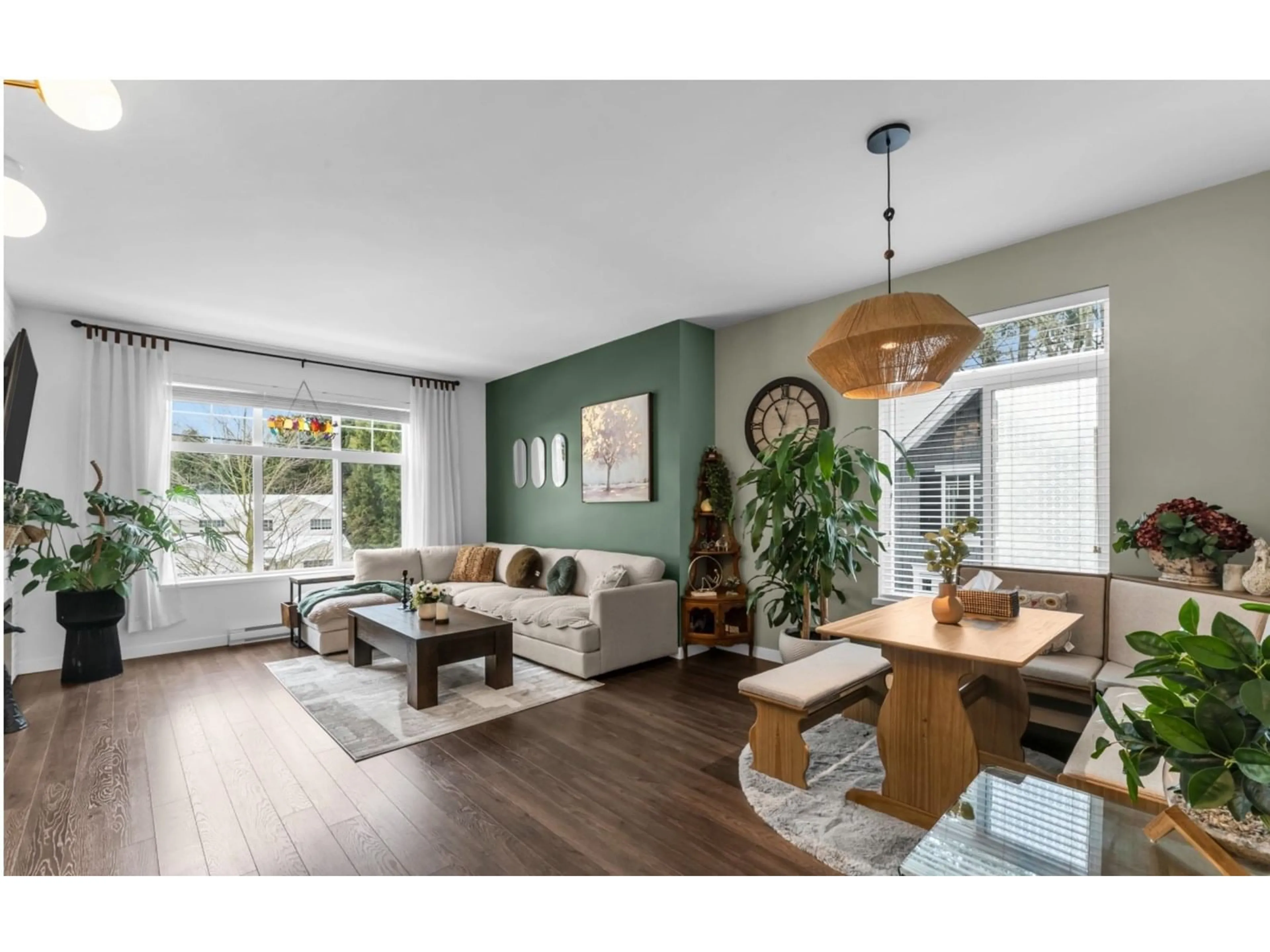 Living room with furniture, wood/laminate floor for 1 - 16357 15, Surrey British Columbia V4A0C2