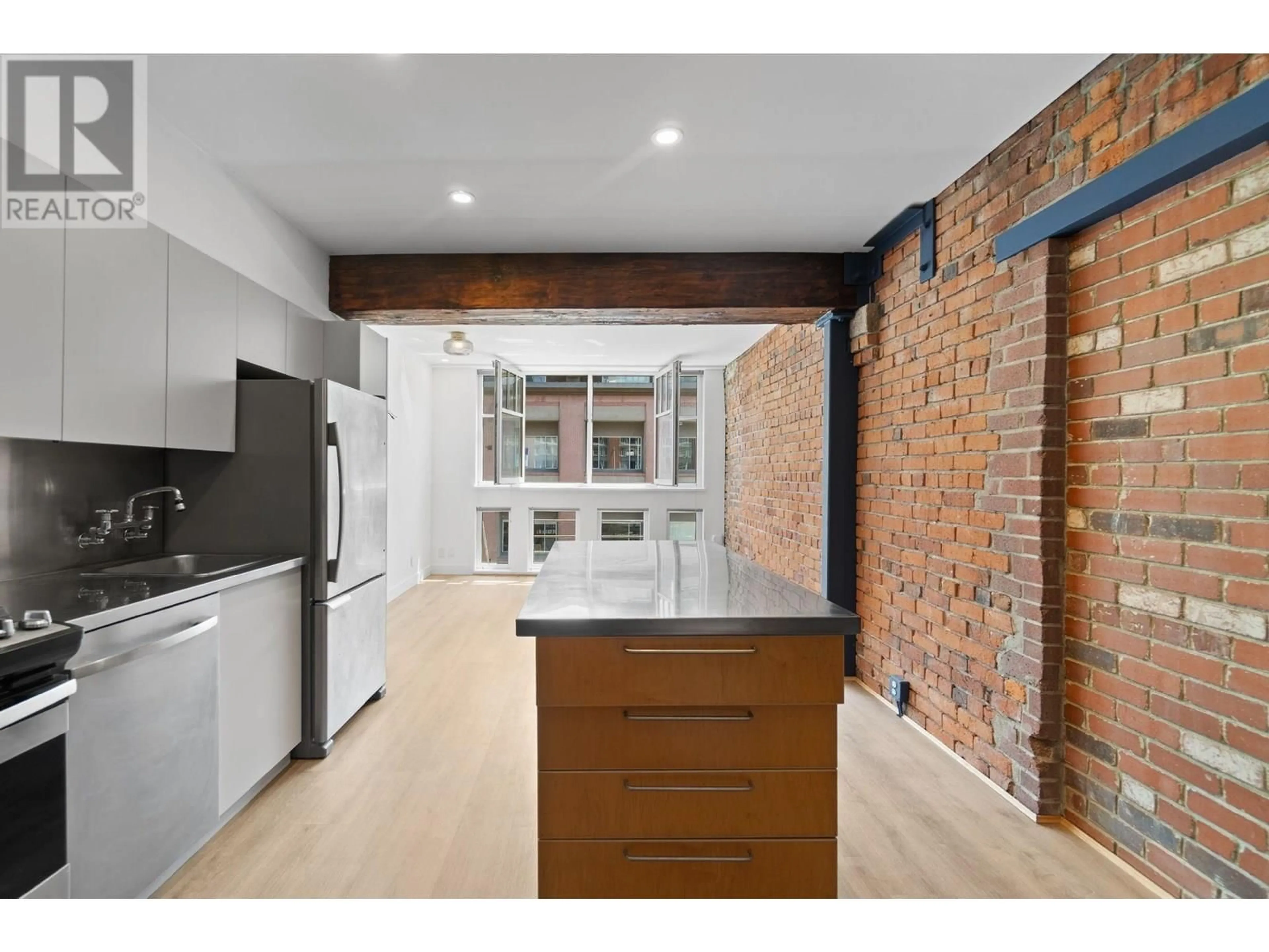 Open concept kitchen, unknown for 308 - 1072 HAMILTON STREET, Vancouver British Columbia V6B2R9
