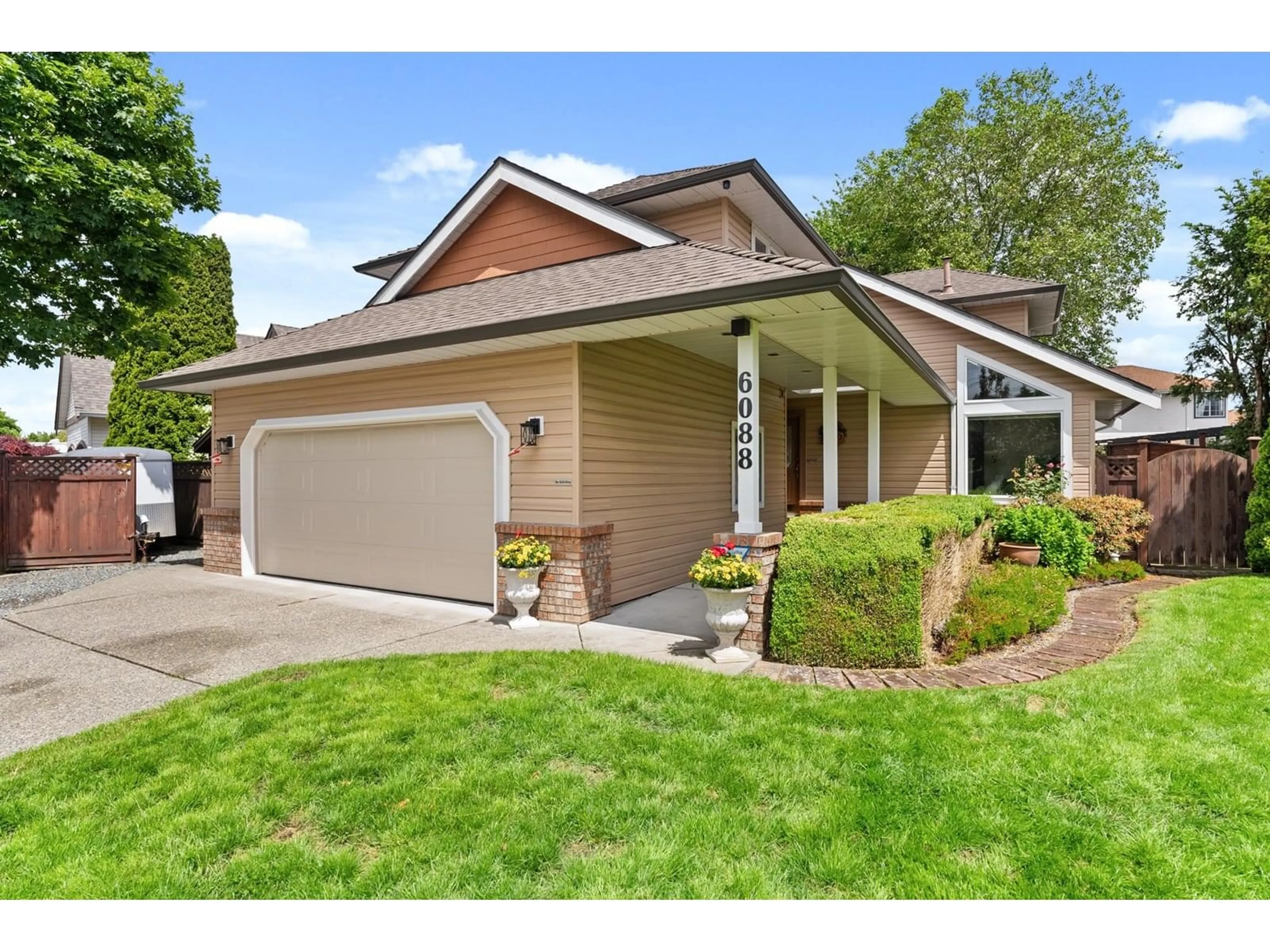 Home with vinyl exterior material, street for 6088 184A, Surrey British Columbia V3S7P7