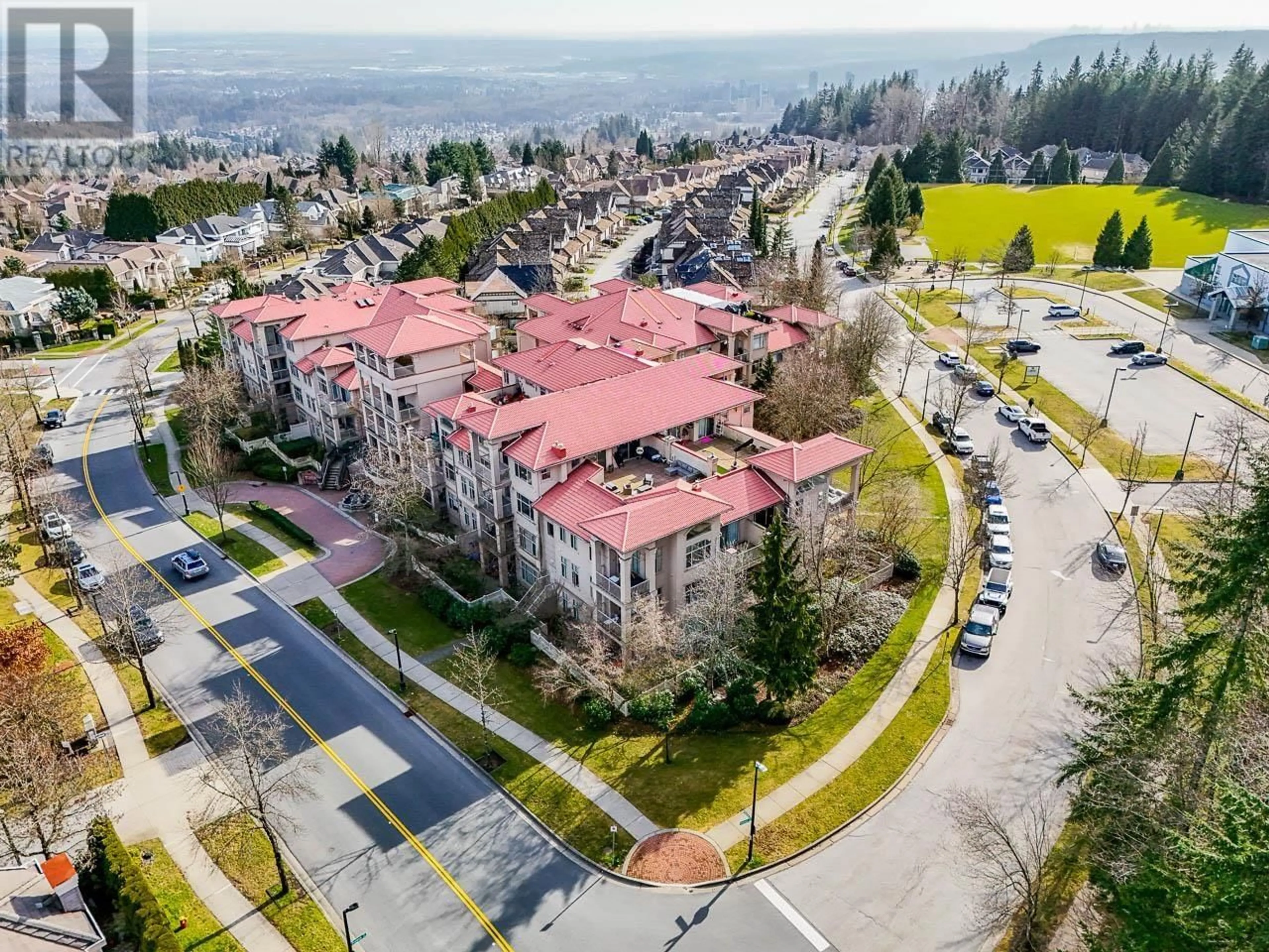 A pic from outside/outdoor area/front of a property/back of a property/a pic from drone, unknown for 408 - 3176 PLATEAU BOULEVARD, Coquitlam British Columbia V3E3J2