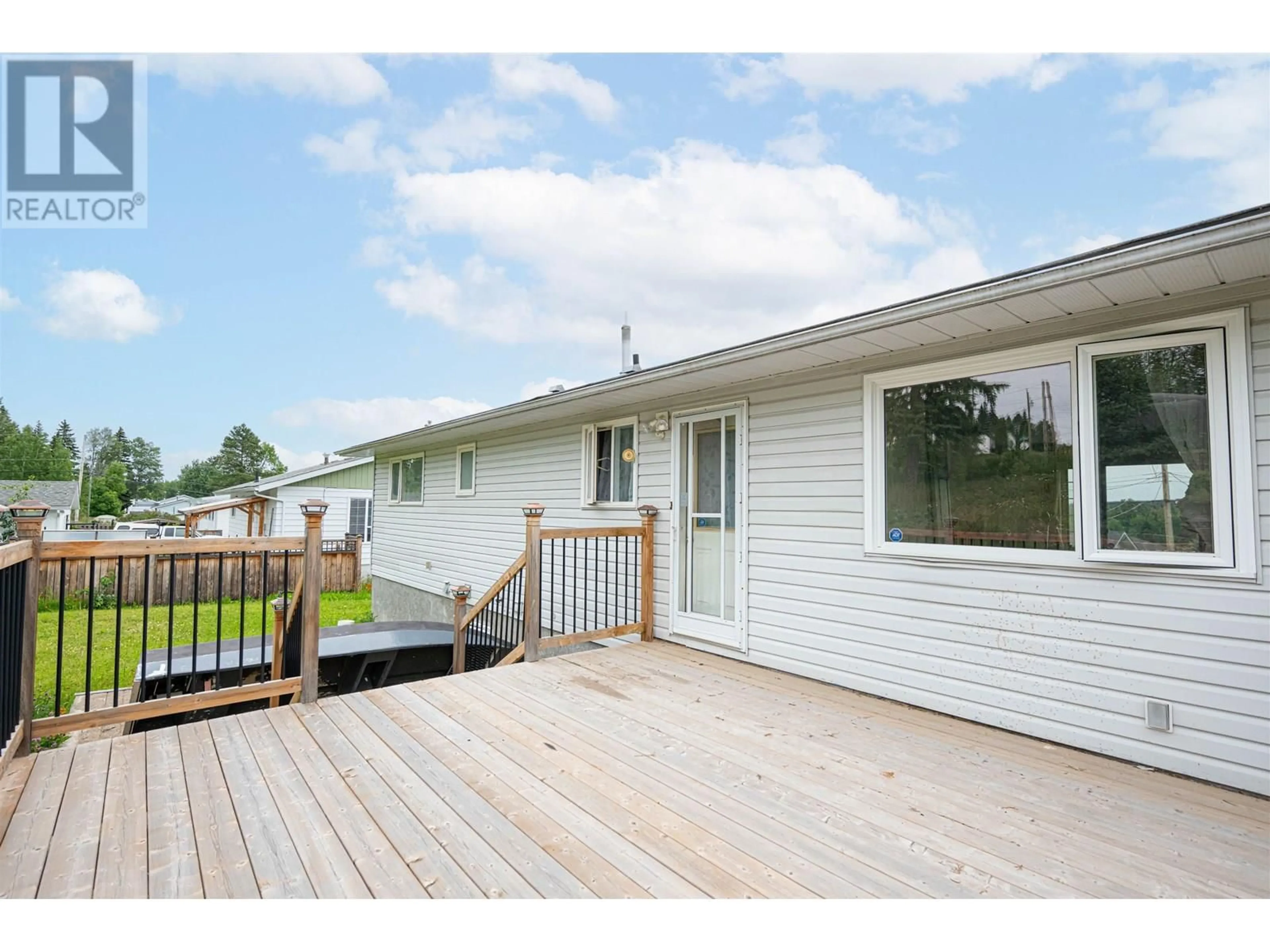 Home with vinyl exterior material, water/lake/river/ocean view for 7278 THOMPSON DRIVE, Prince George British Columbia V2N5N4