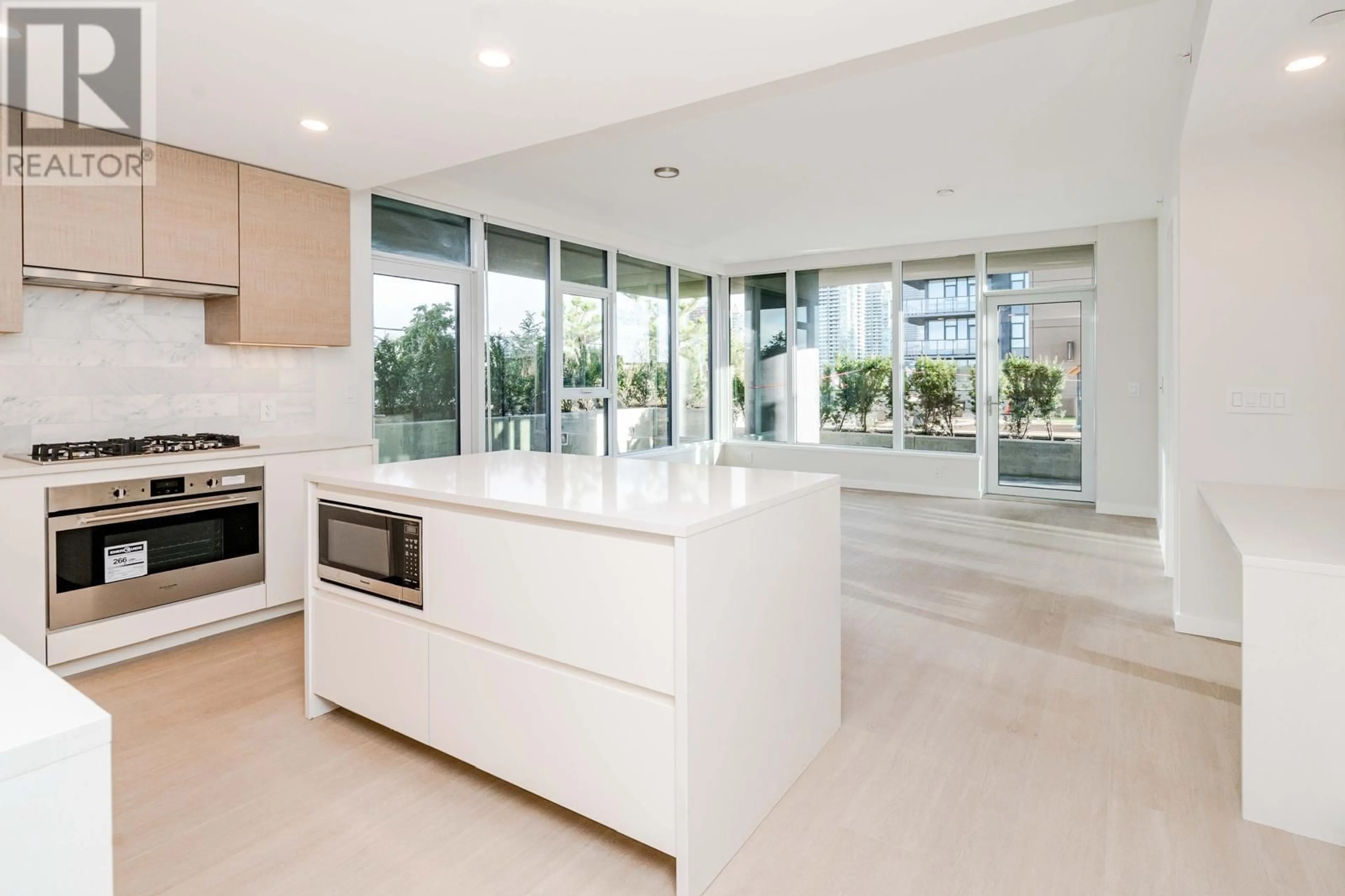 Contemporary kitchen, ceramic/tile floor for 607 - 2108 GILMORE AVENUE, Burnaby British Columbia V5C6A8