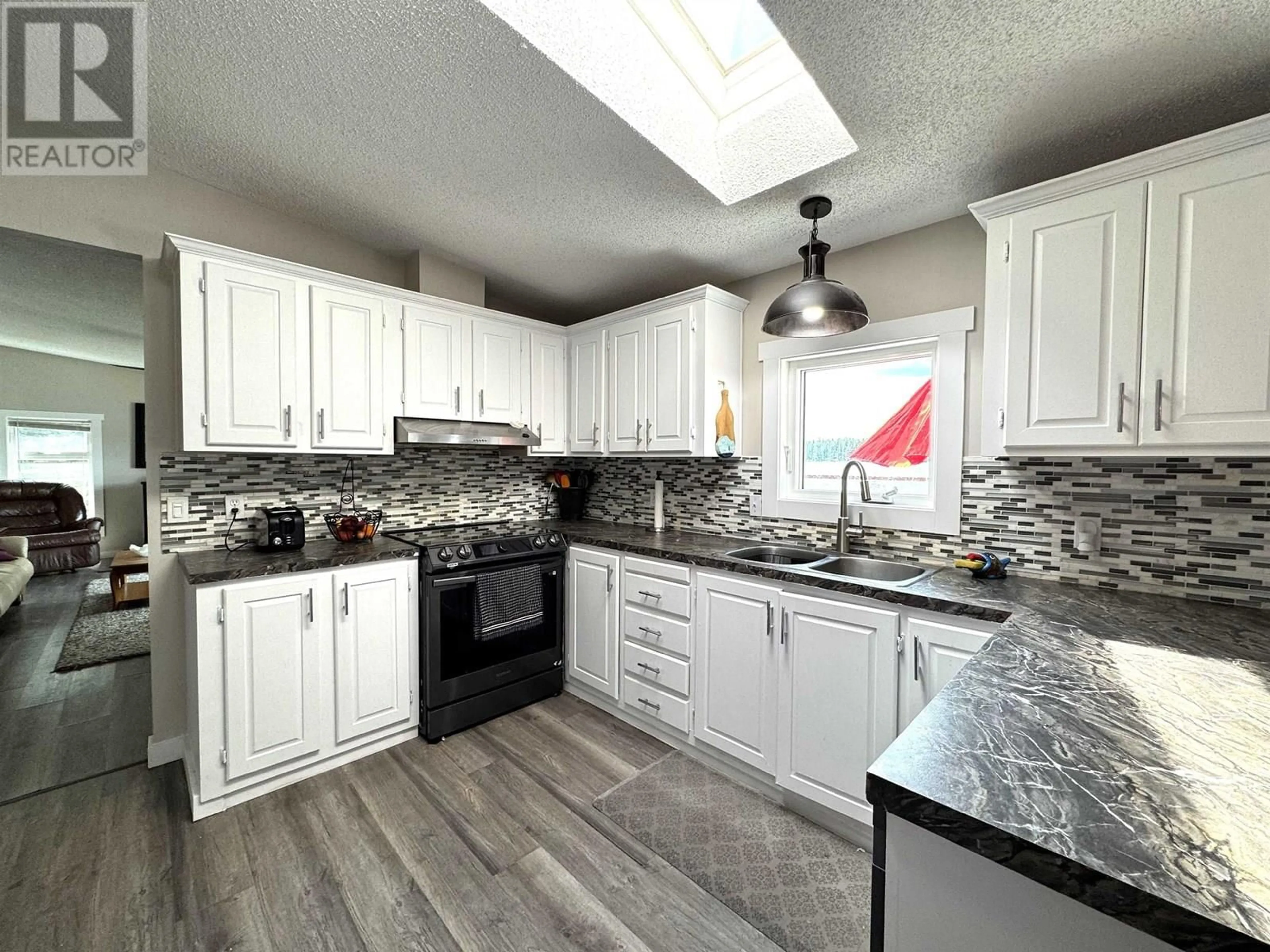 Open concept kitchen, ceramic/tile floor for 6247 LYNES CREEK ROAD, Williams Lake British Columbia V2G4Z1