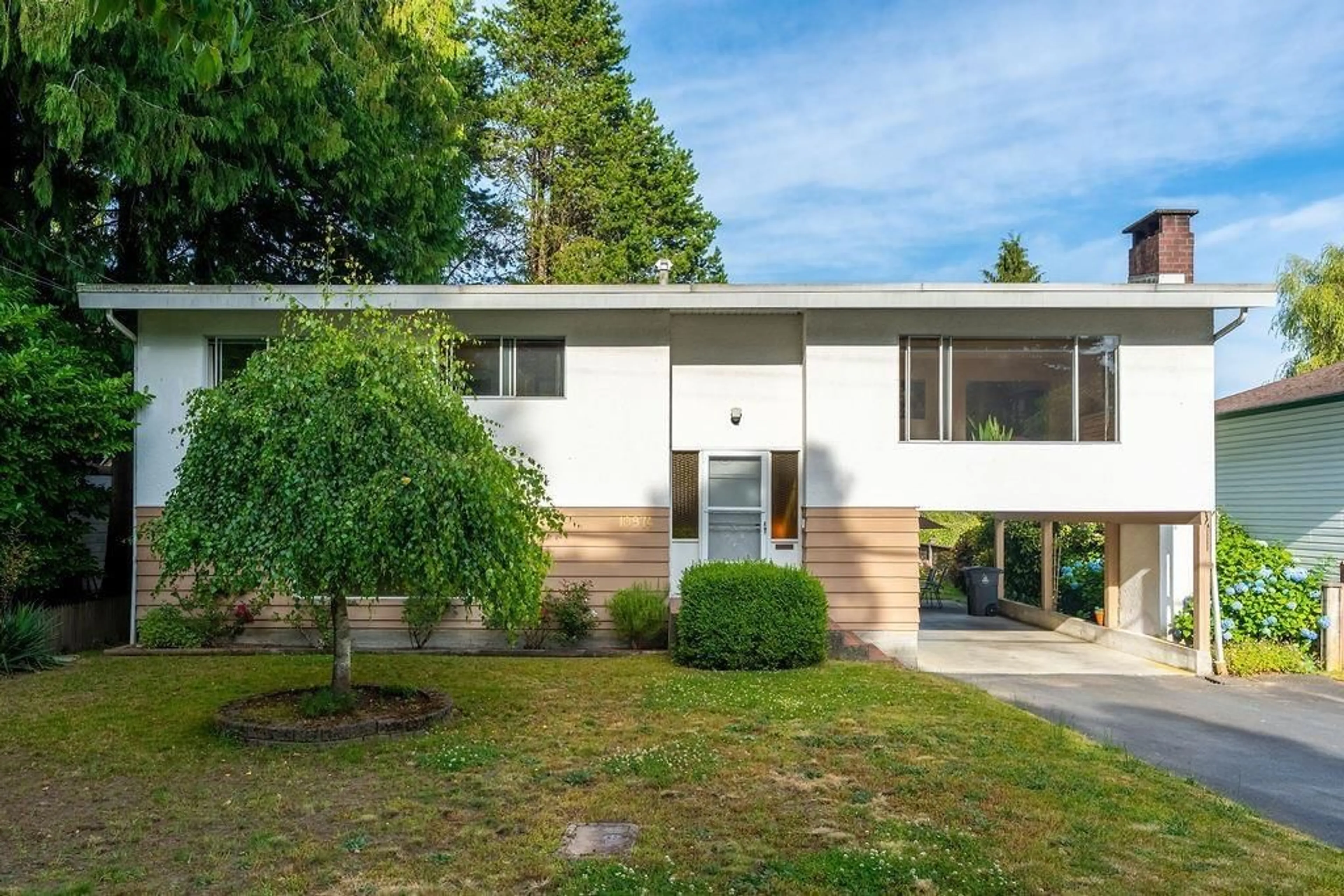 Home with vinyl exterior material, street for 10974 144A, Surrey British Columbia V3R3R2