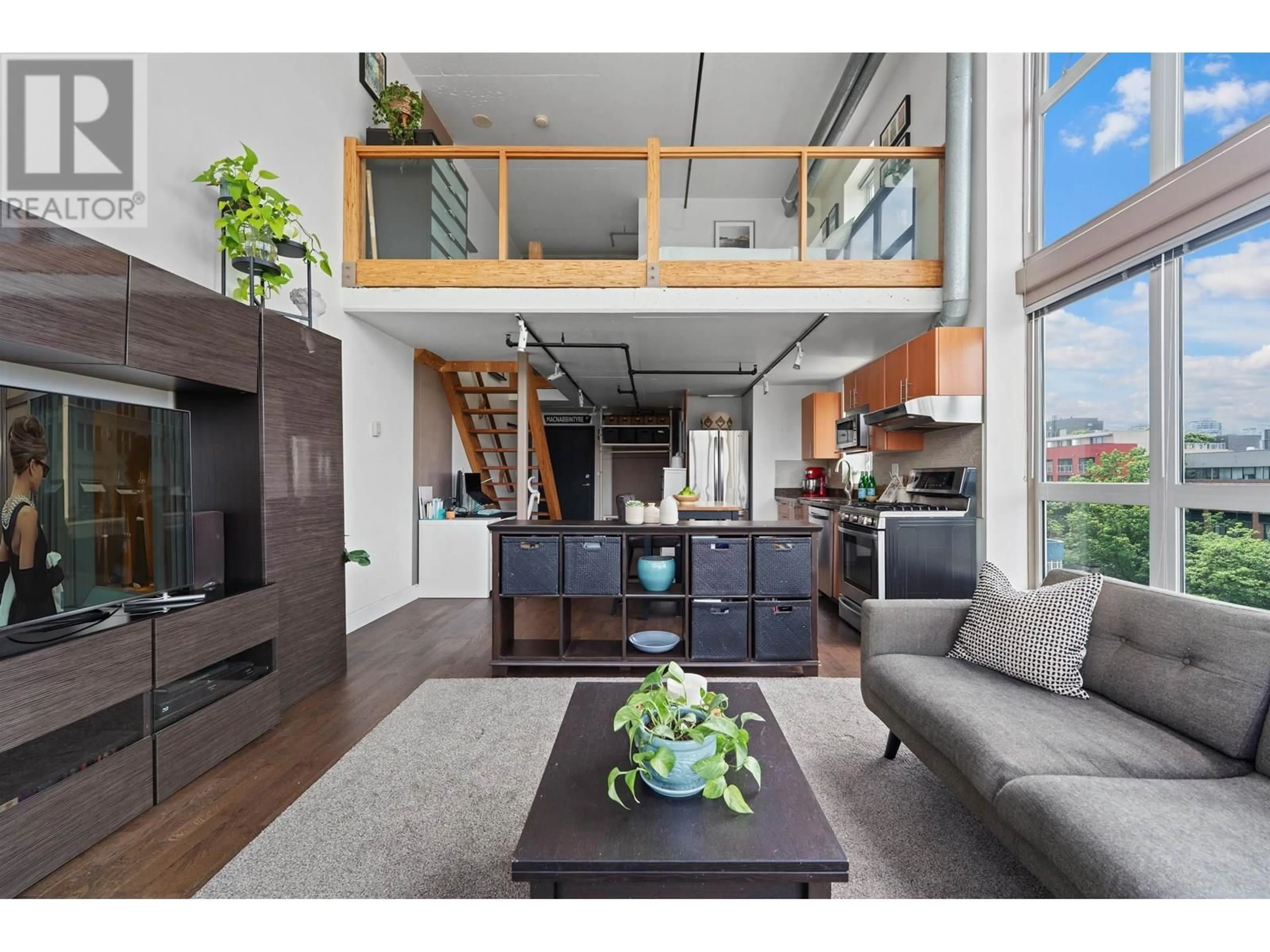 Open concept kitchen, wood/laminate floor for 605 - 289 ALEXANDER STREET, Vancouver British Columbia V6A4H6