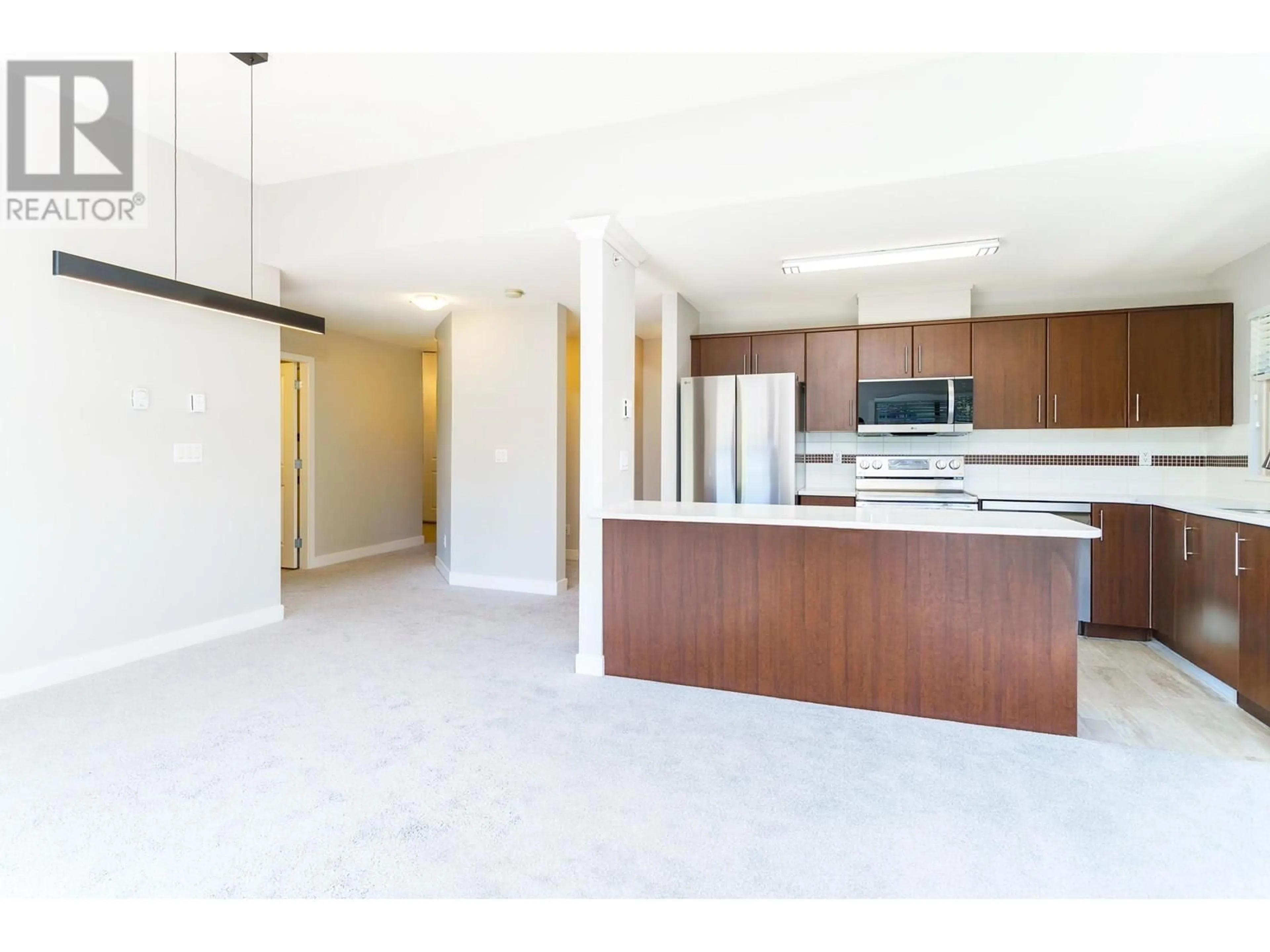 Open concept kitchen, ceramic/tile floor for 423 - 12238 224 STREET, Maple Ridge British Columbia V2X8W5