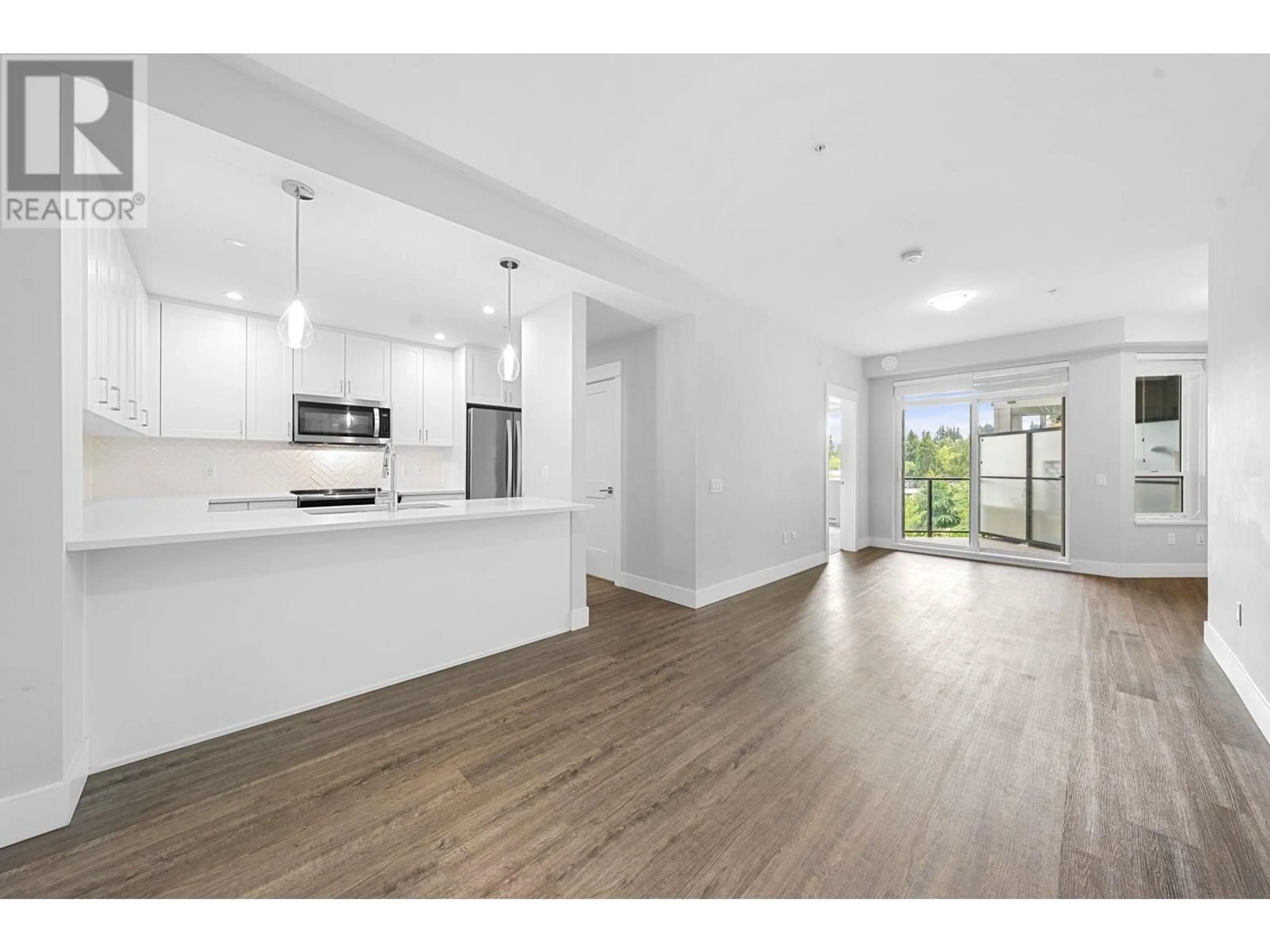 Open concept kitchen, wood/laminate floor for 4420 - 2180 KELLY AVENUE, Port Coquitlam British Columbia V3C0L1